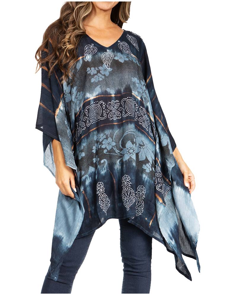 Woman wearing a blue patterned poncho on a white background