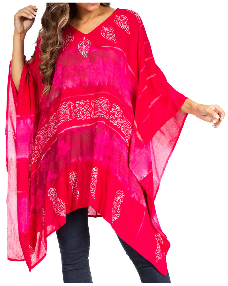 Red kaftan with white patterns worn by a model on a white background