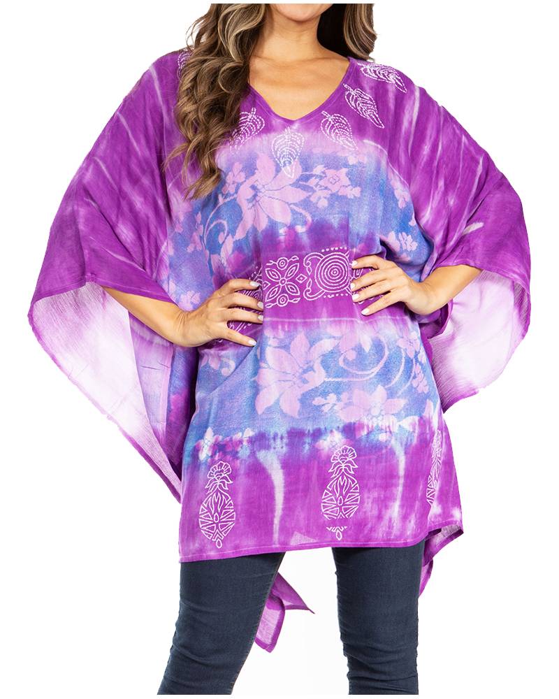 Purple and blue patterned top worn by a person on a white background