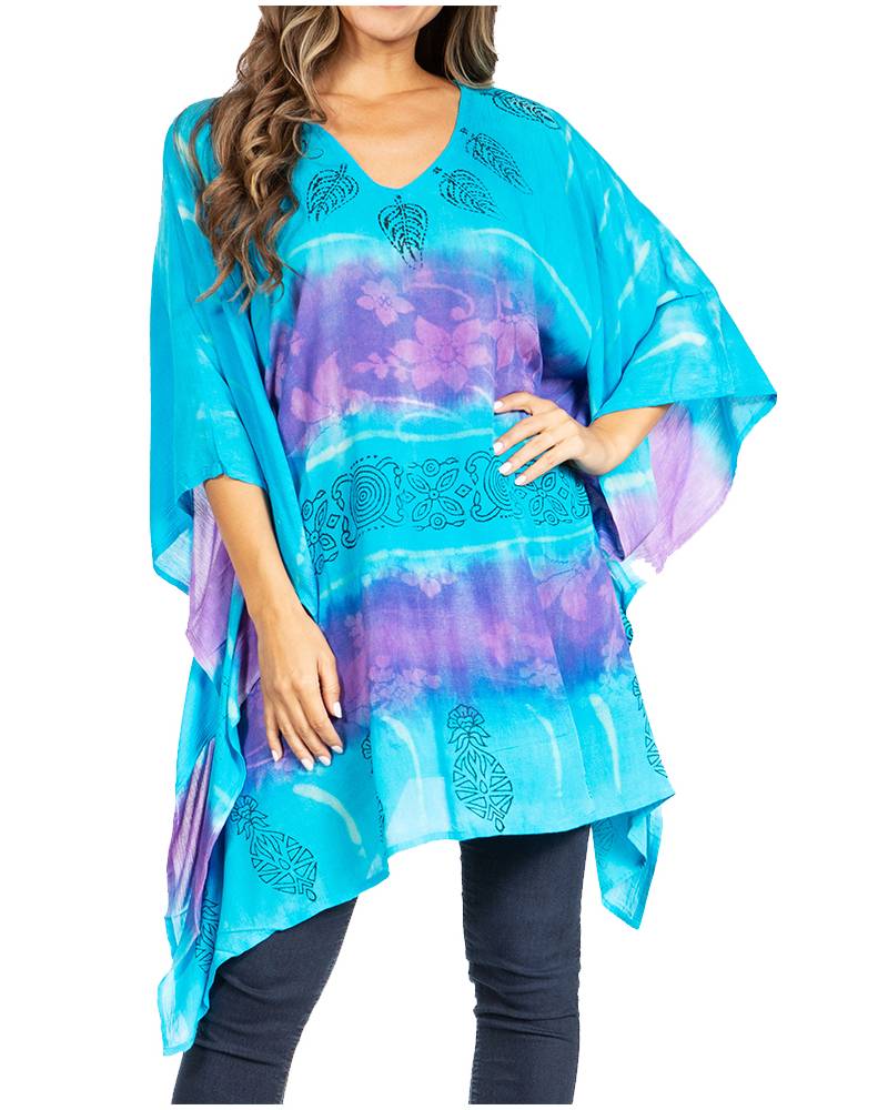 Woman wearing a blue and purple patterned kaftan on a white background