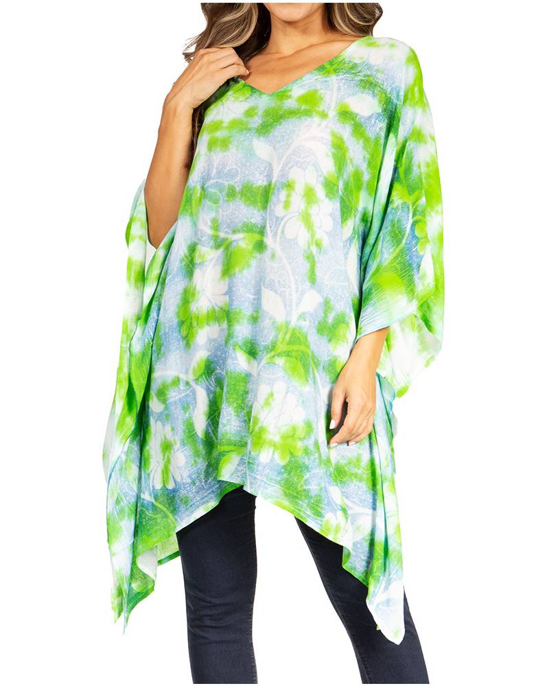 Woman wearing a green and blue tie-dye top with a white background