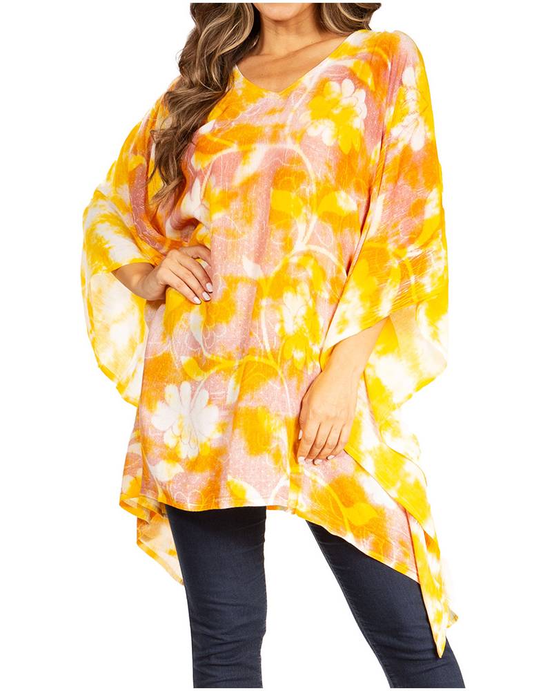 Woman wearing a yellow floral patterned top on a white background