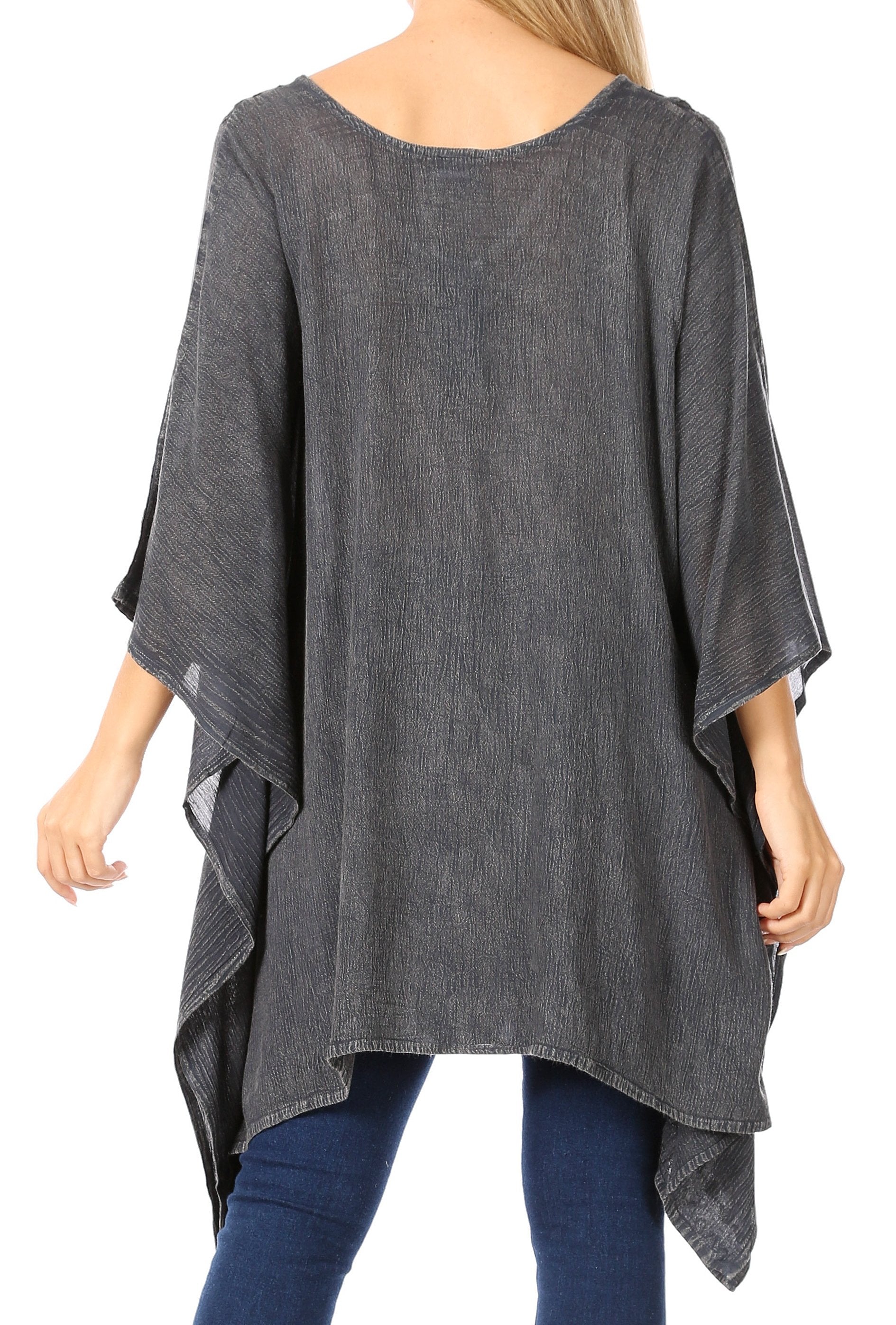 Gray poncho worn by a person on a white background