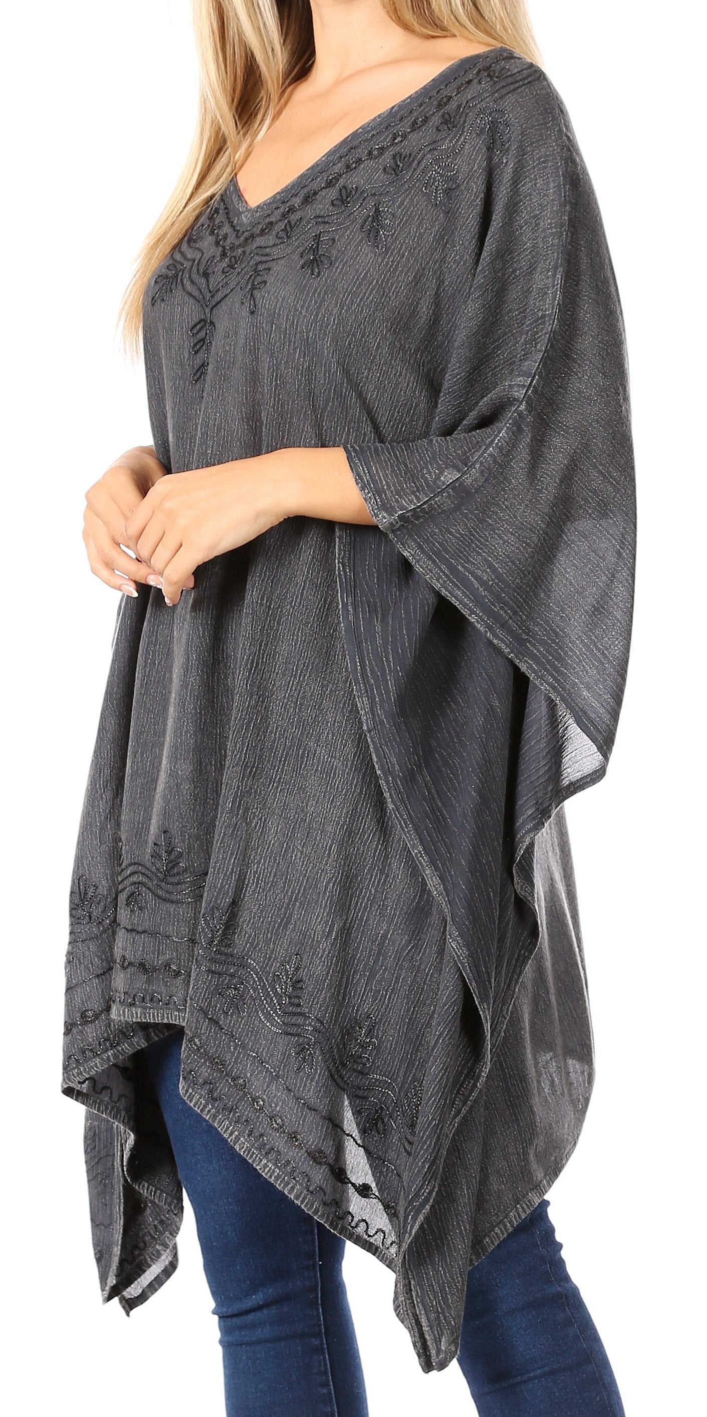 Gray poncho with embroidery on a white background
