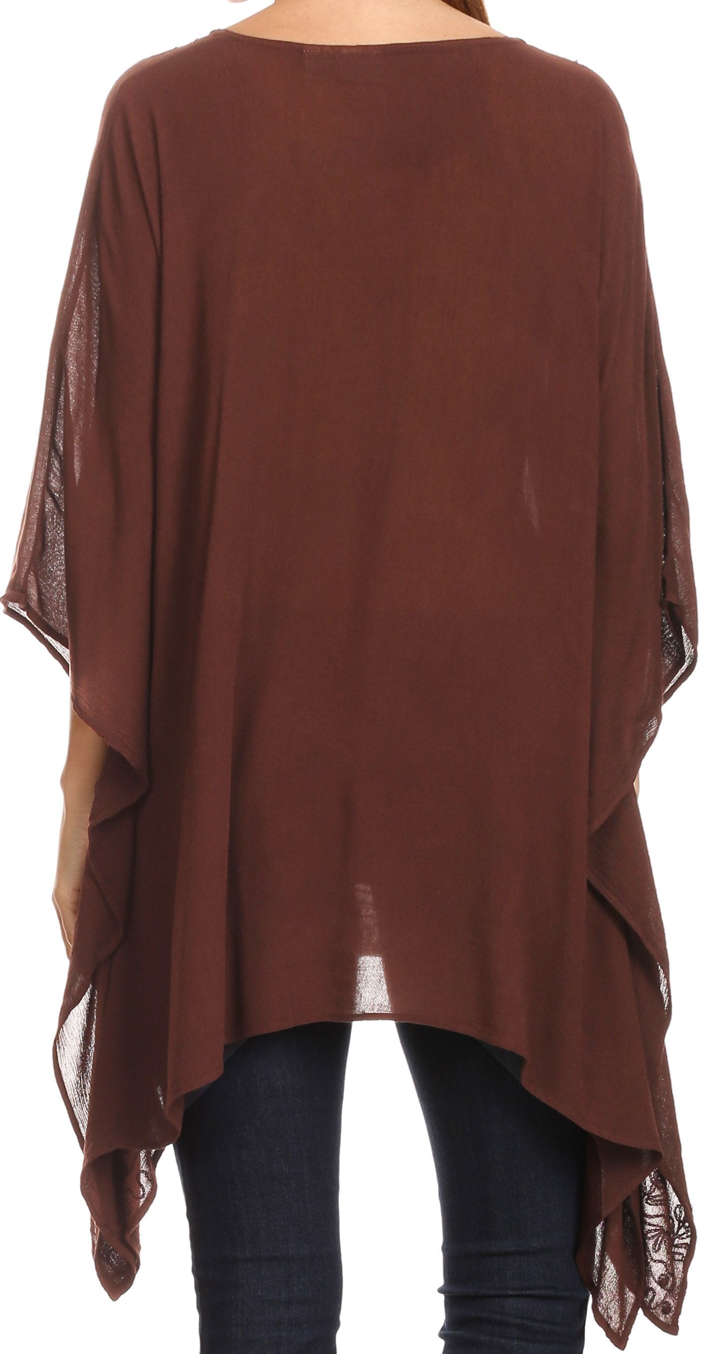 Brown poncho with sheer sleeves on a white background