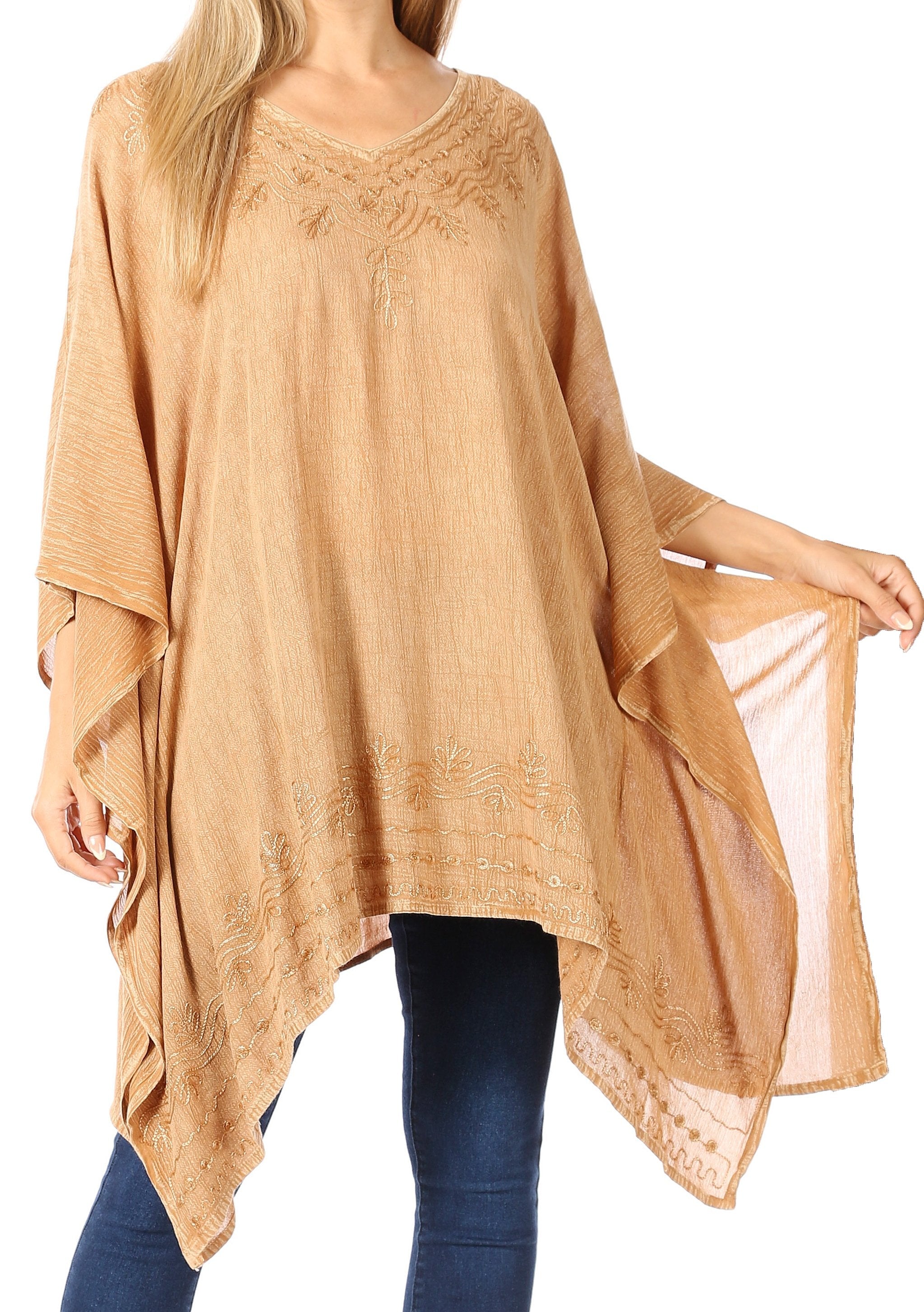 Beige lace top worn by a person on a white background
