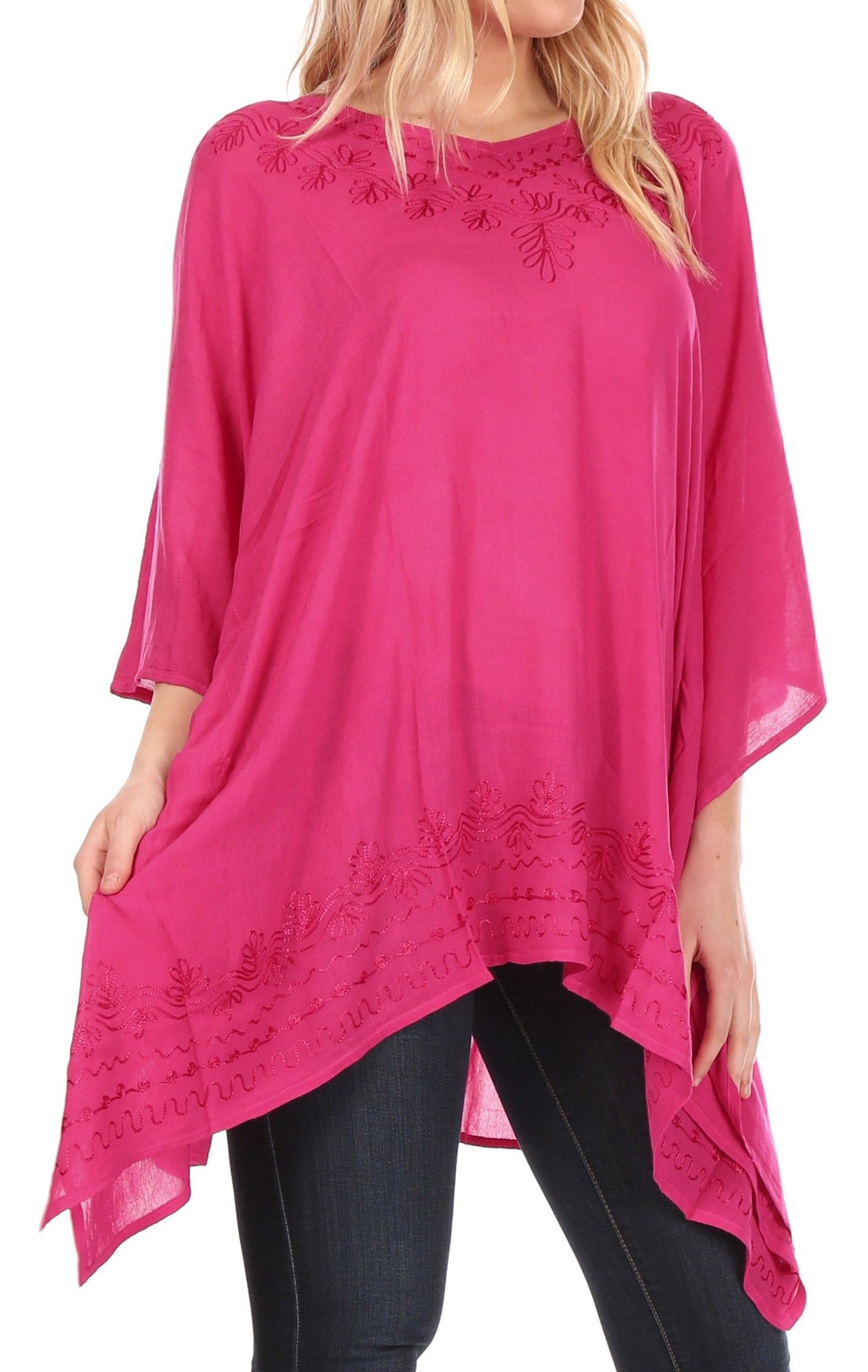 Pink lace-trimmed top worn by a person on a white background