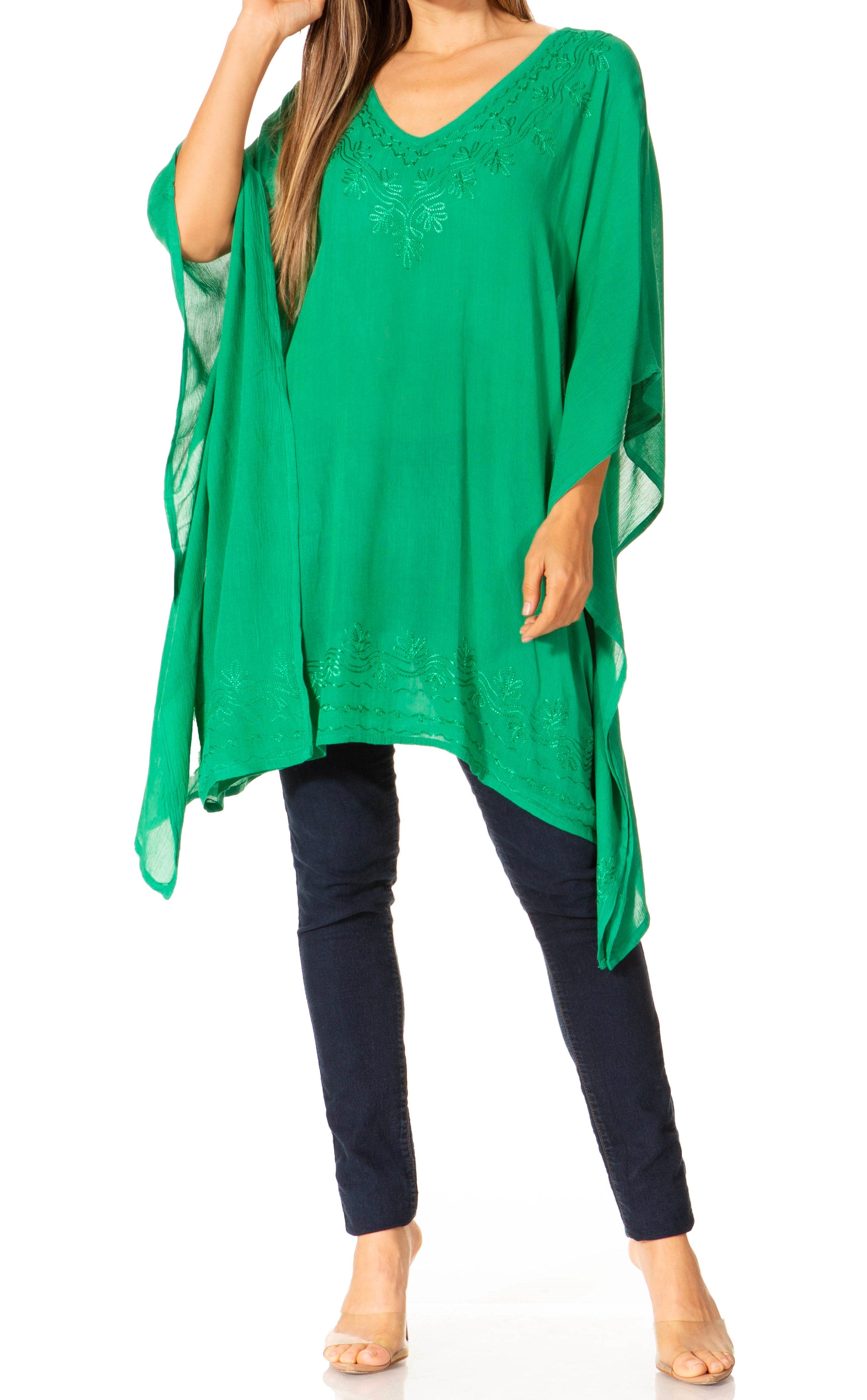 Green poncho over a plain background