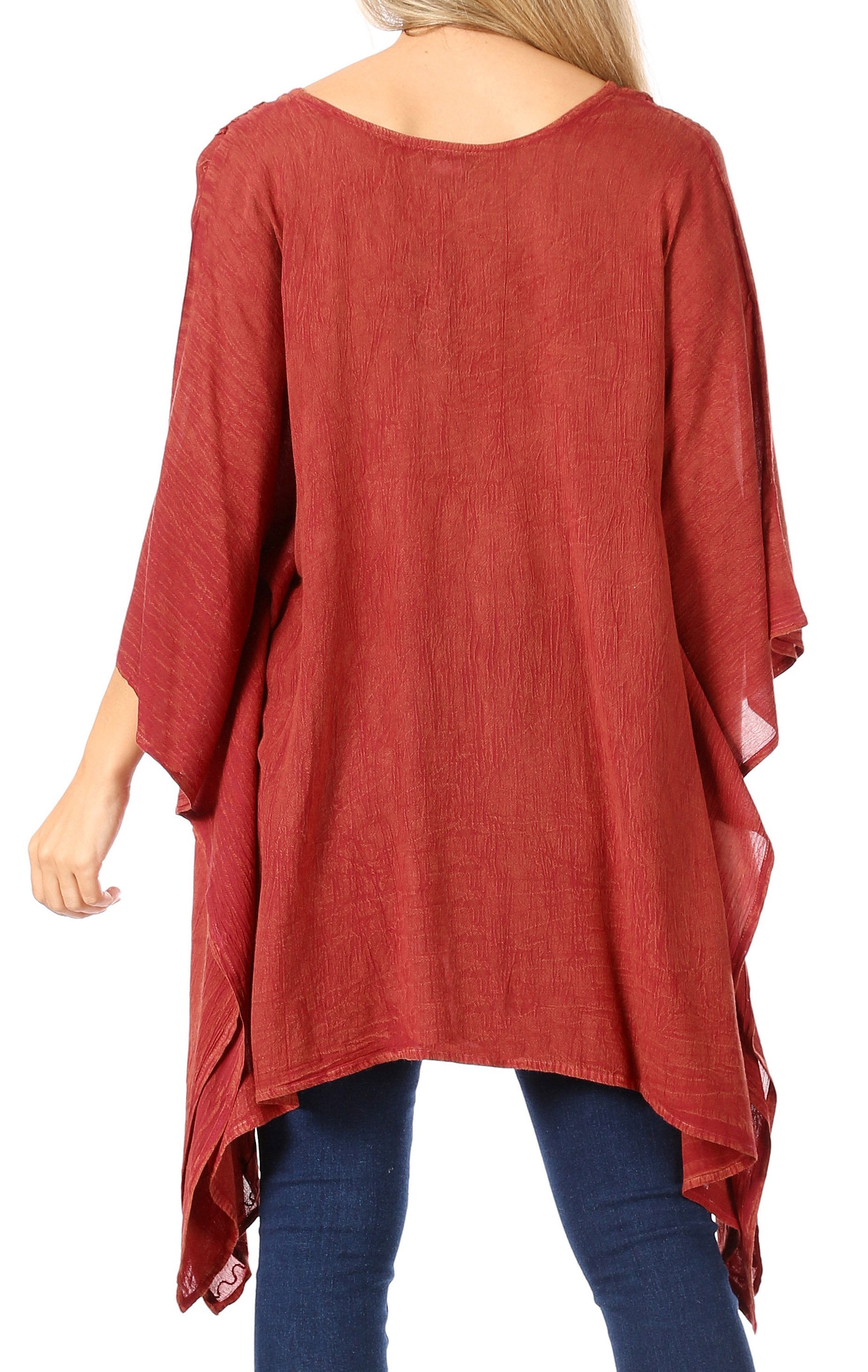 Red poncho worn by a person on a white background
