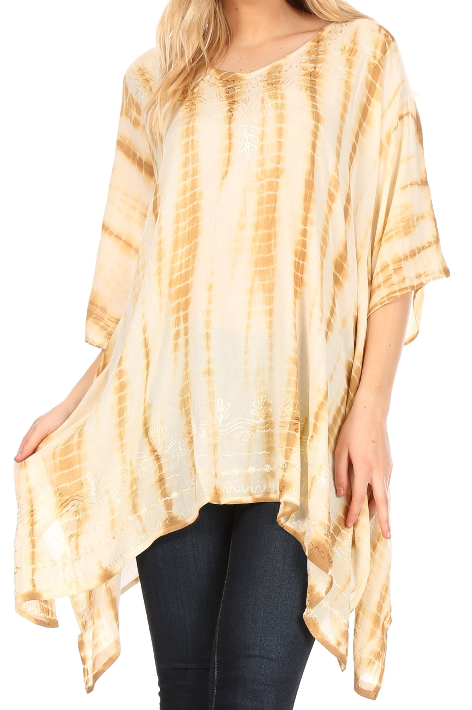 Woman wearing a yellow and white tie-dye shirt with a plain background