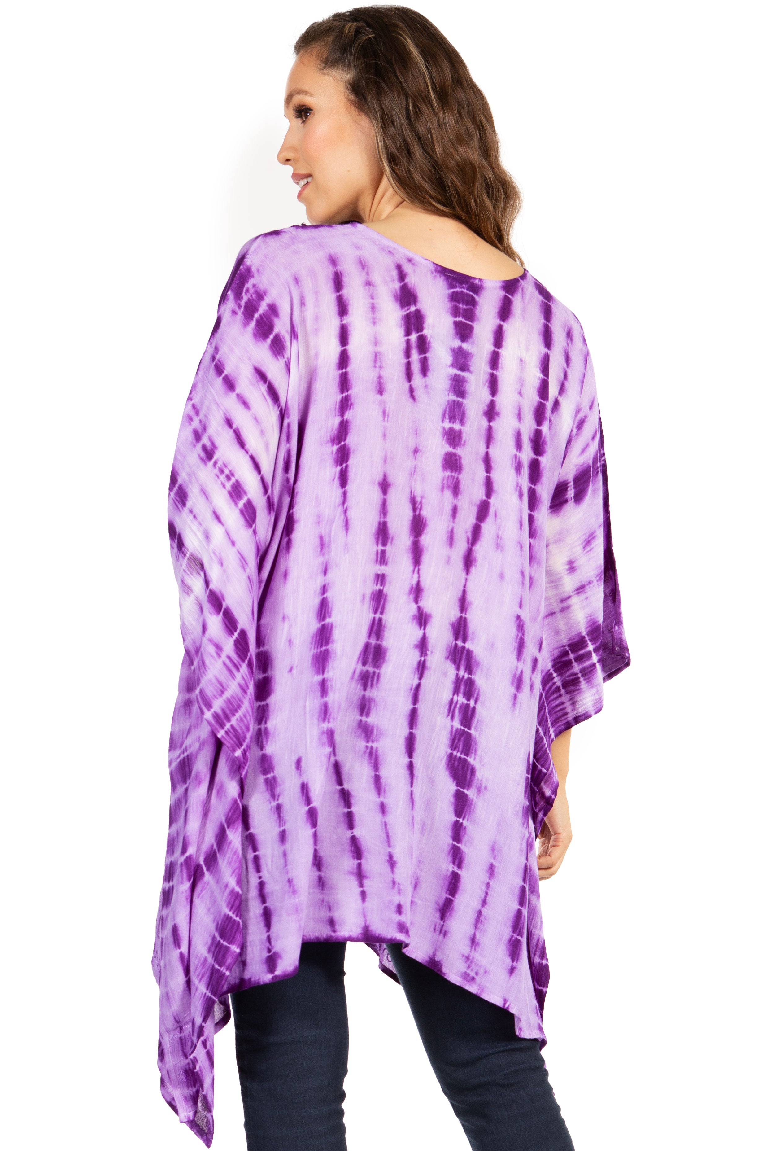 Woman wearing a purple tie-dye shirt on a white background