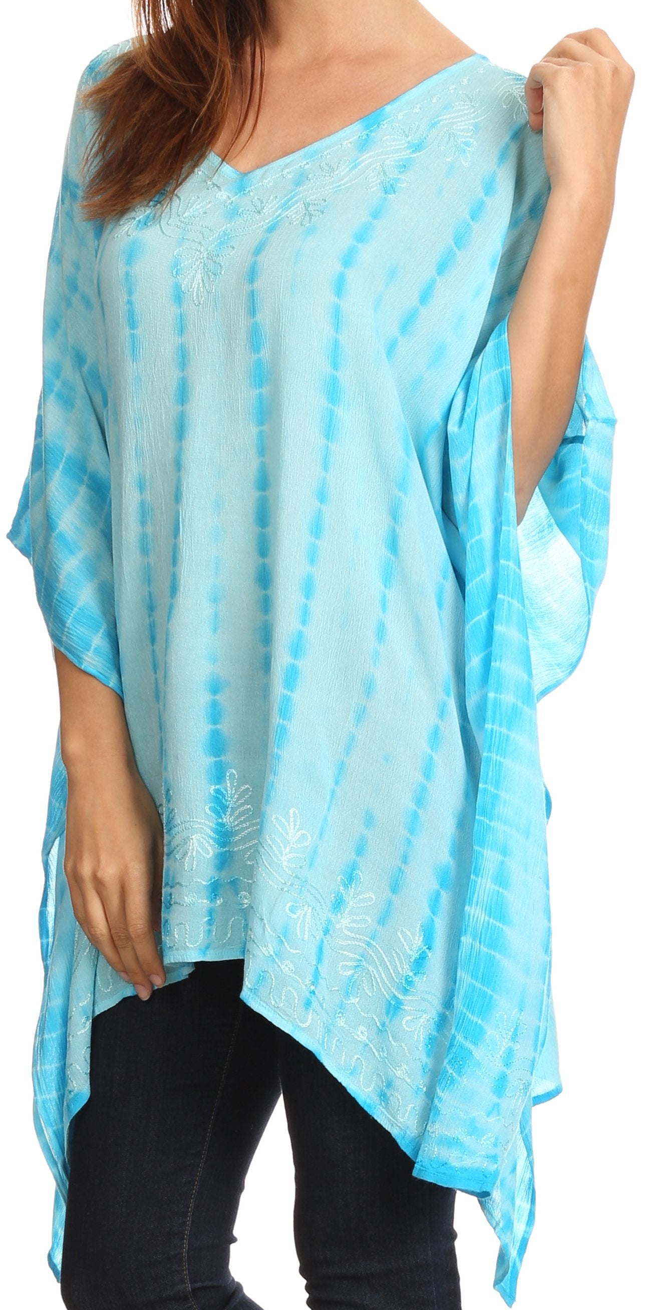 Light blue tie-dye poncho worn by a person