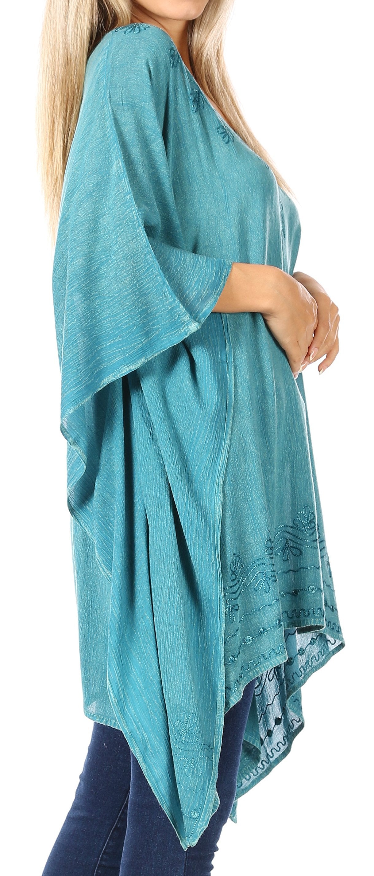 Teal kimono-style garment worn by a person on a white background