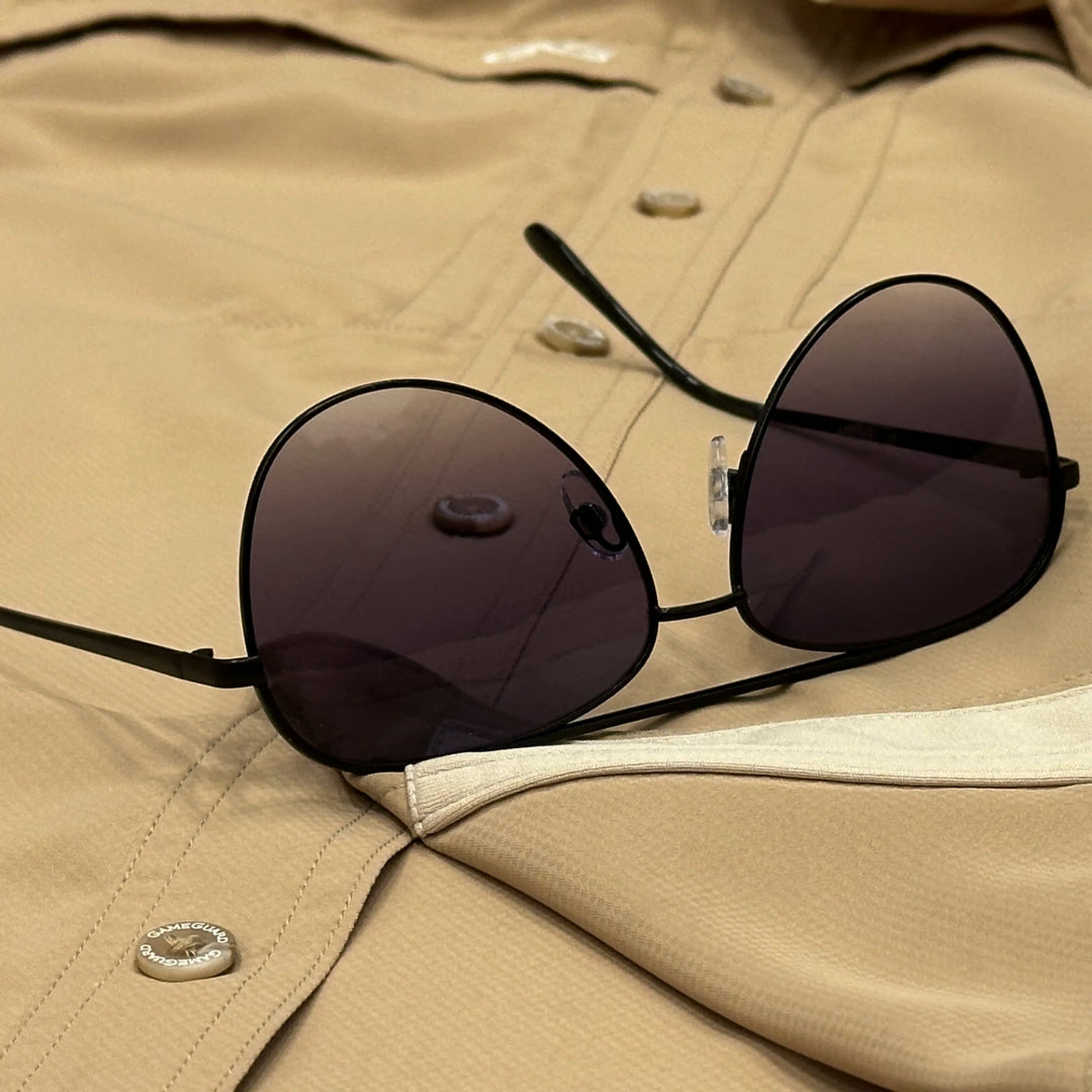 Sunglasses on a beige jacket