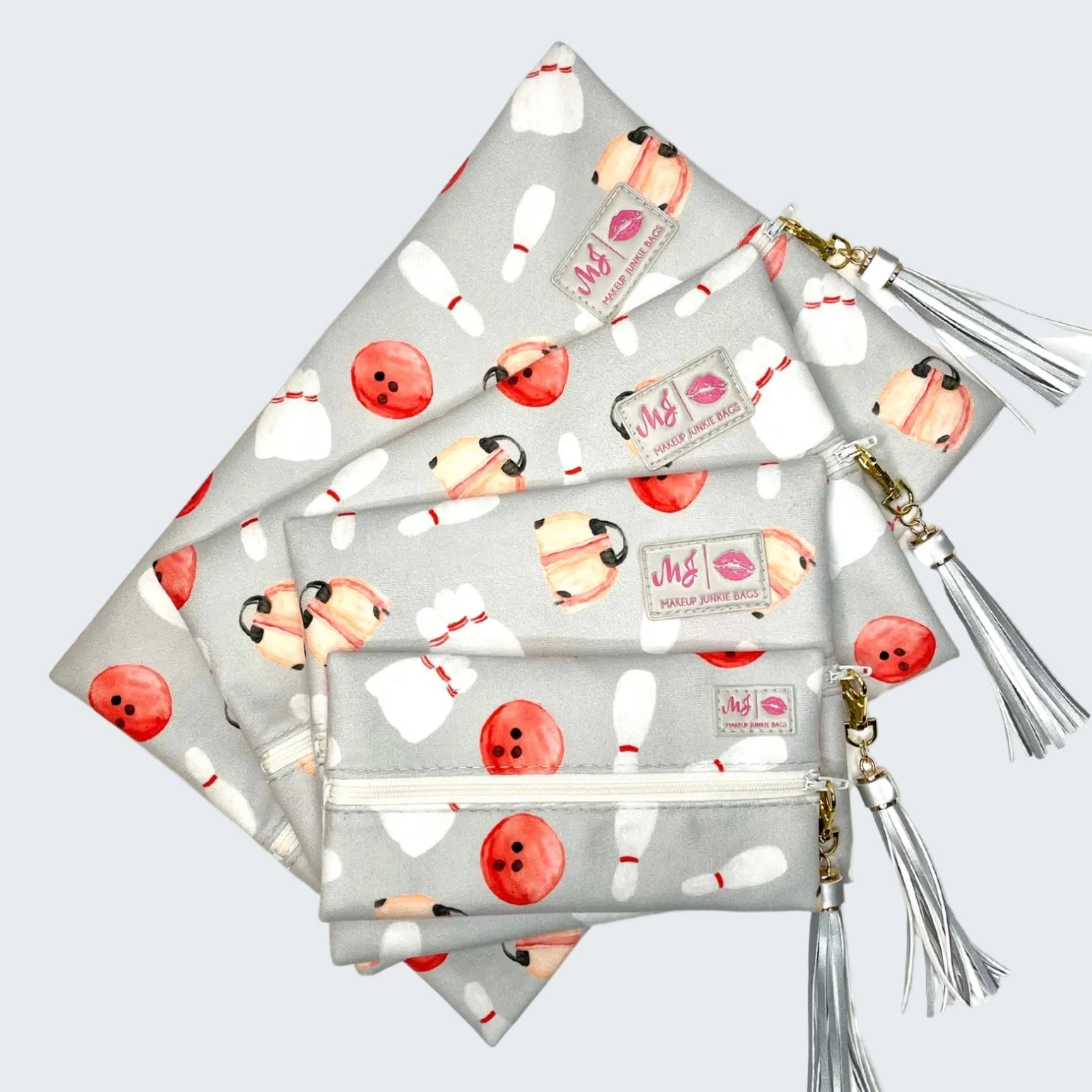Set of pouches with tassels on a white background