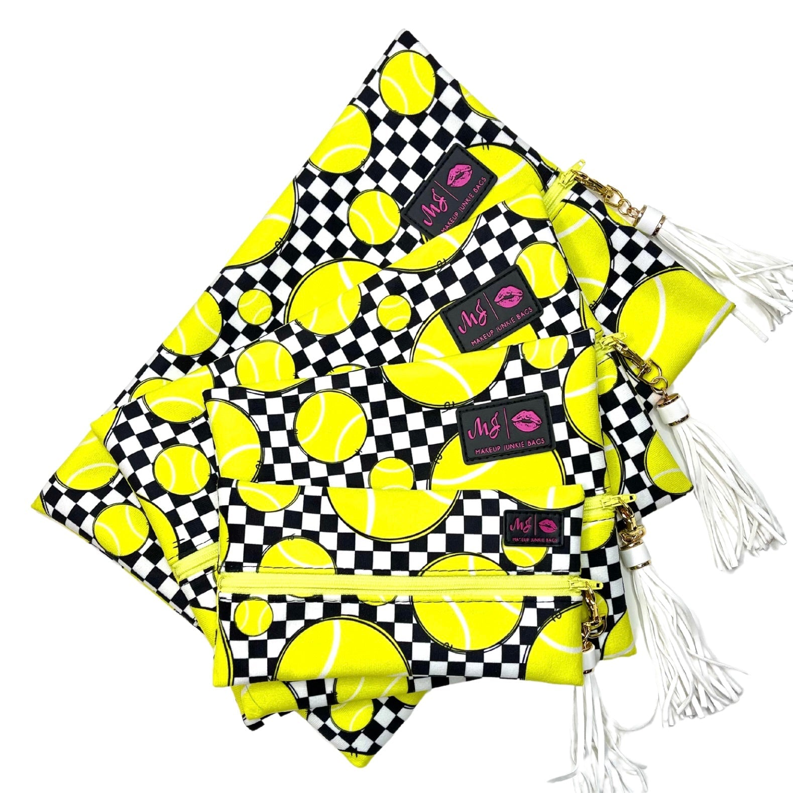 Two pouches with tennis ball pattern and checkered design on a white background