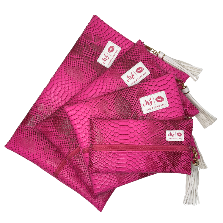 Set of pink mesh bags with white labels on a white background