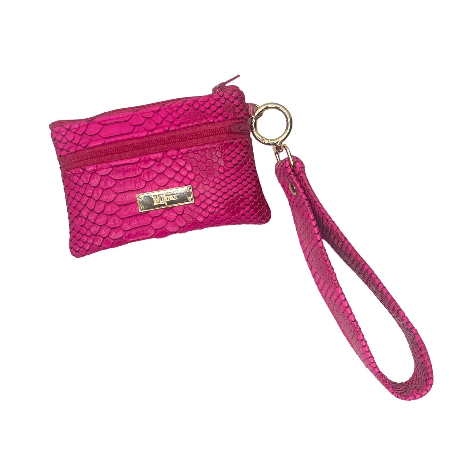 Pink wristlet with a gold tag on a white background