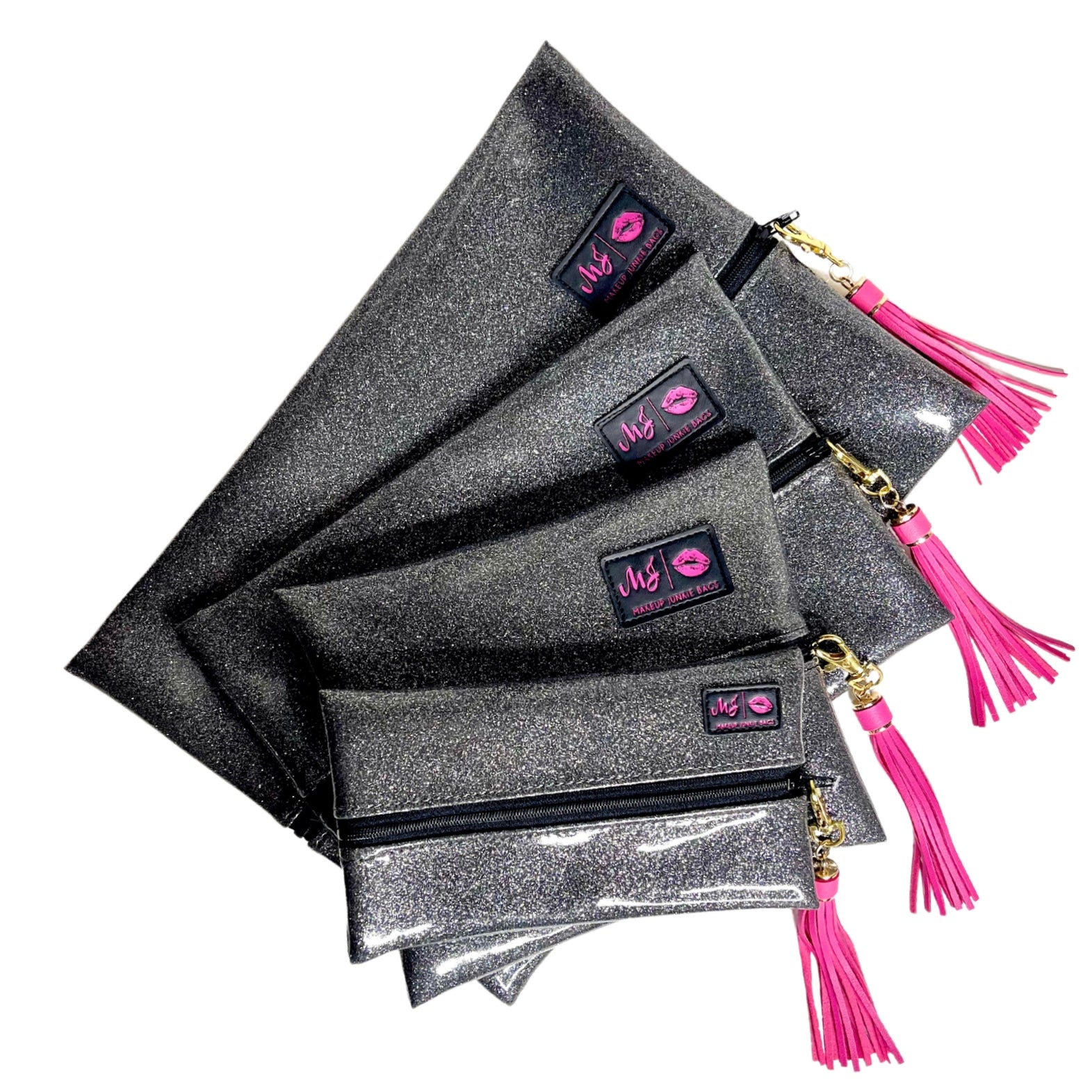 Set of glittery pouches with pink tassels and visible brand logo on a white background