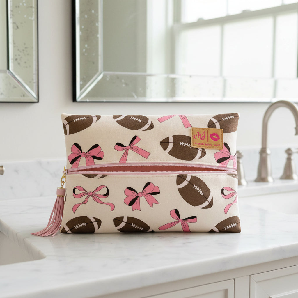 Pouch with football and bow pattern on a beige background