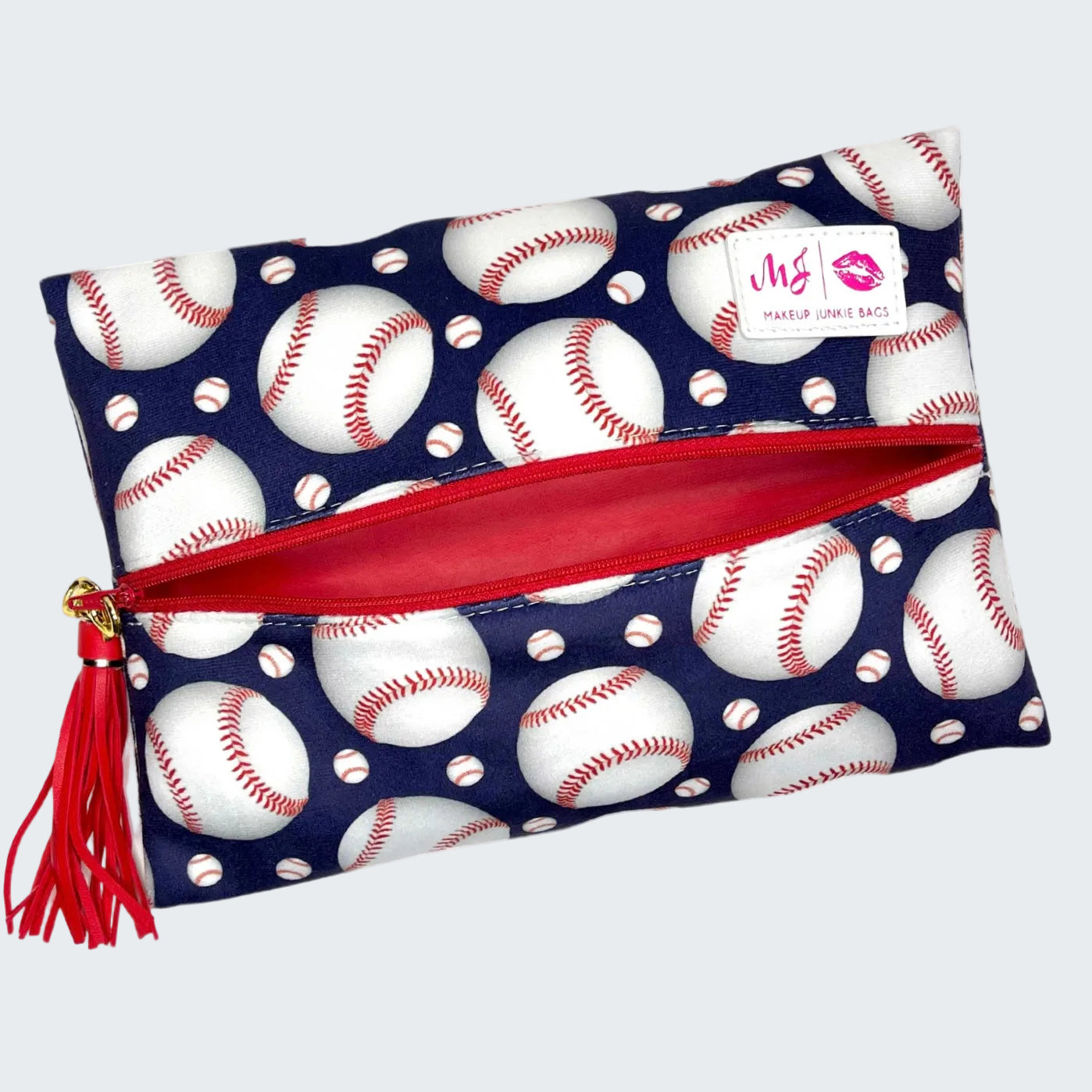 Makeup bag with baseball pattern and red zipper on a white background