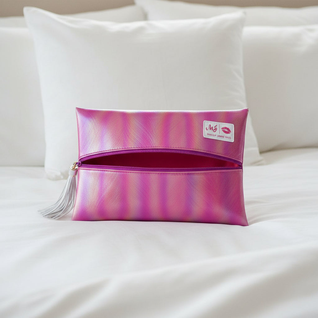 Pink and purple makeup bag with a visible brand logo on a light gray background