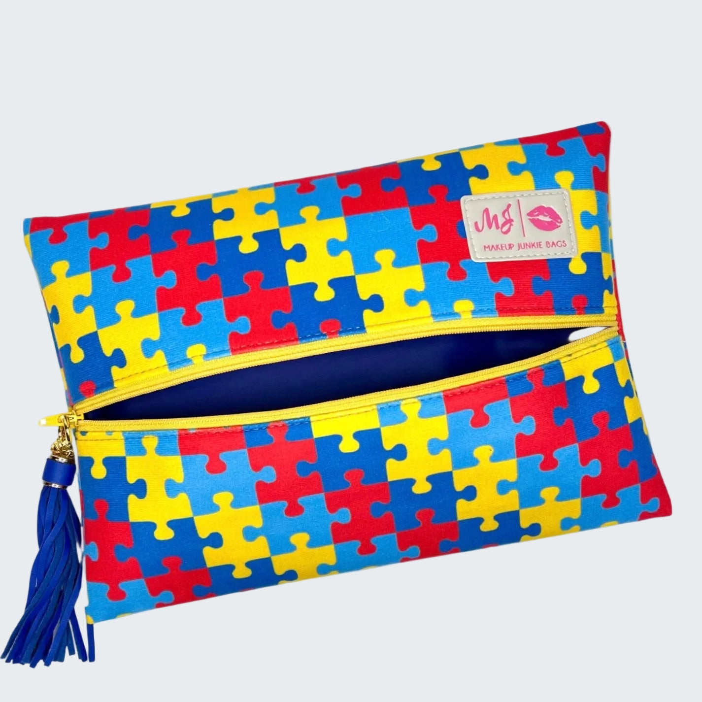 Pouch with puzzle pattern and visible brand logo on a white background