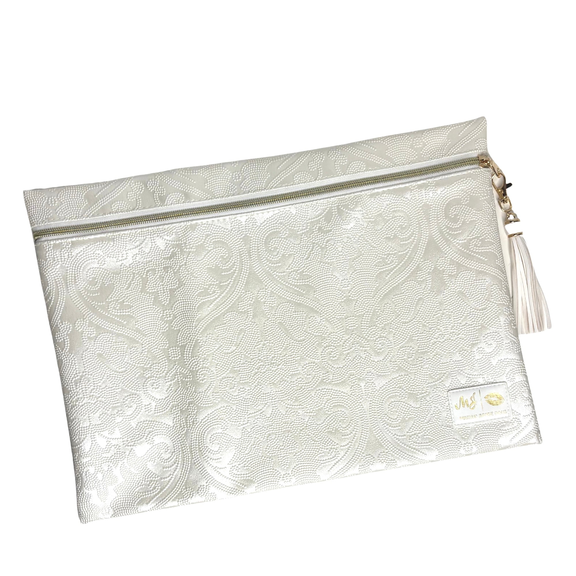 White patterned pouch with a zipper and tassel on a white background