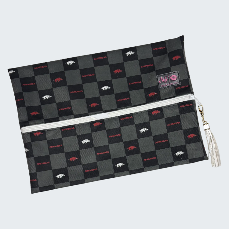 Checkered pouch with tassel on a white background