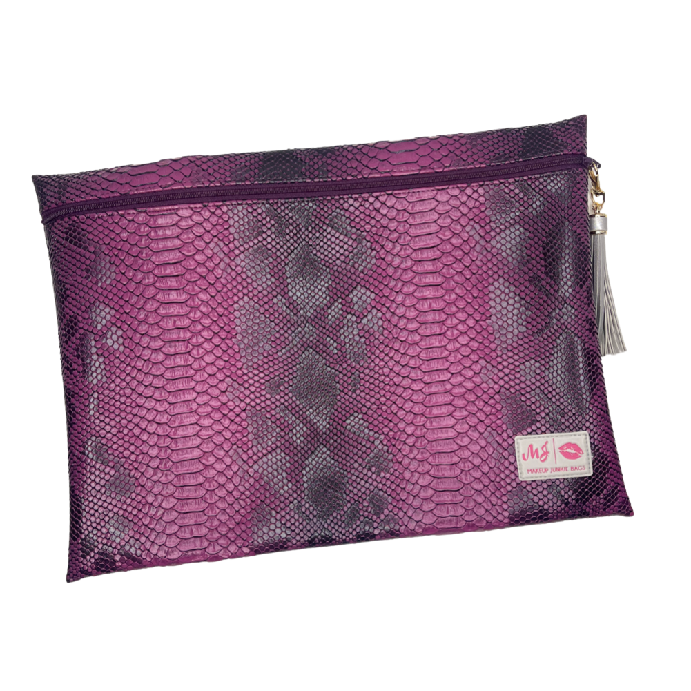 Purple mesh pouch with snake skin pattern on a white background