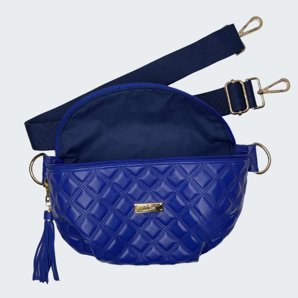 Blue quilted fanny pack with a strap on a white background