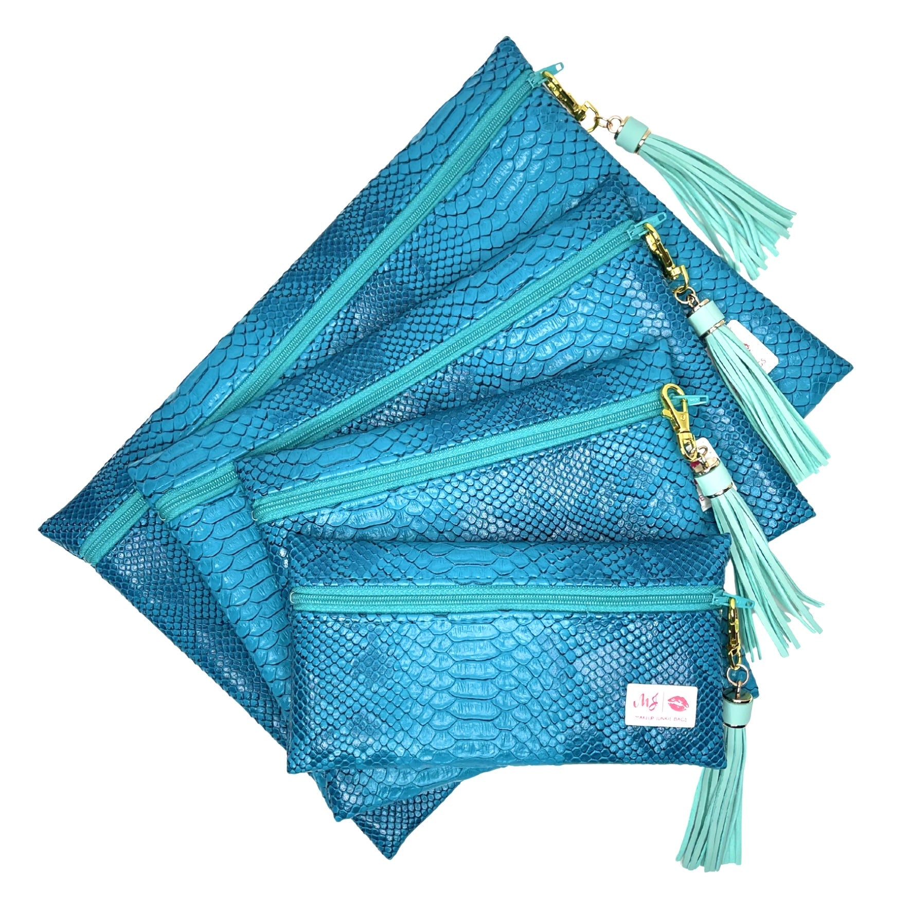 Set of blue pouches with tassels on a white background
