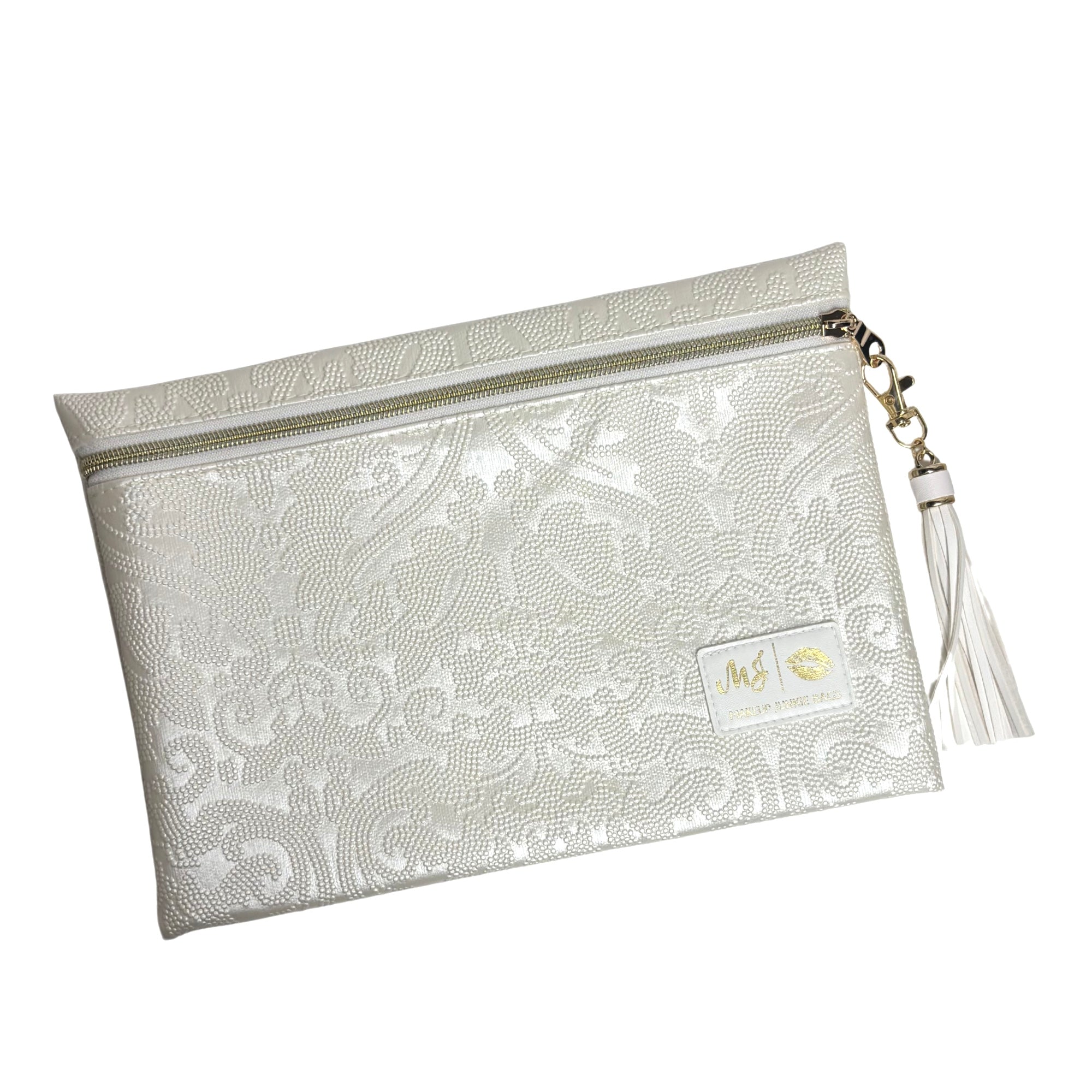 Silver clutch bag with tassel on a white background