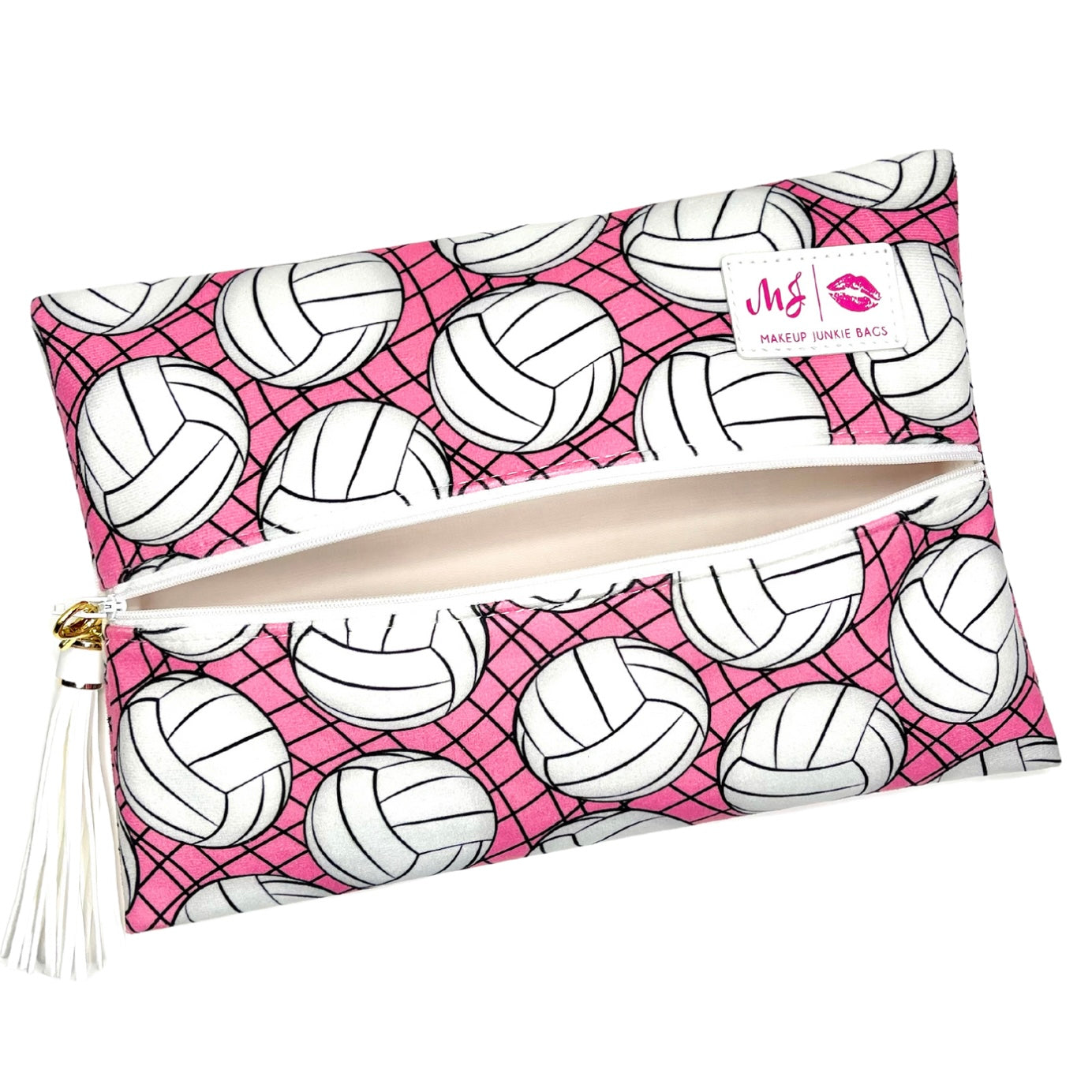Makeup bag with volleyball pattern on pink background