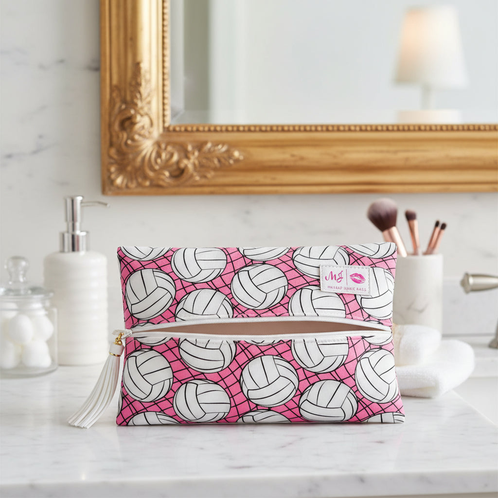 Makeup bag with volleyball pattern on pink background