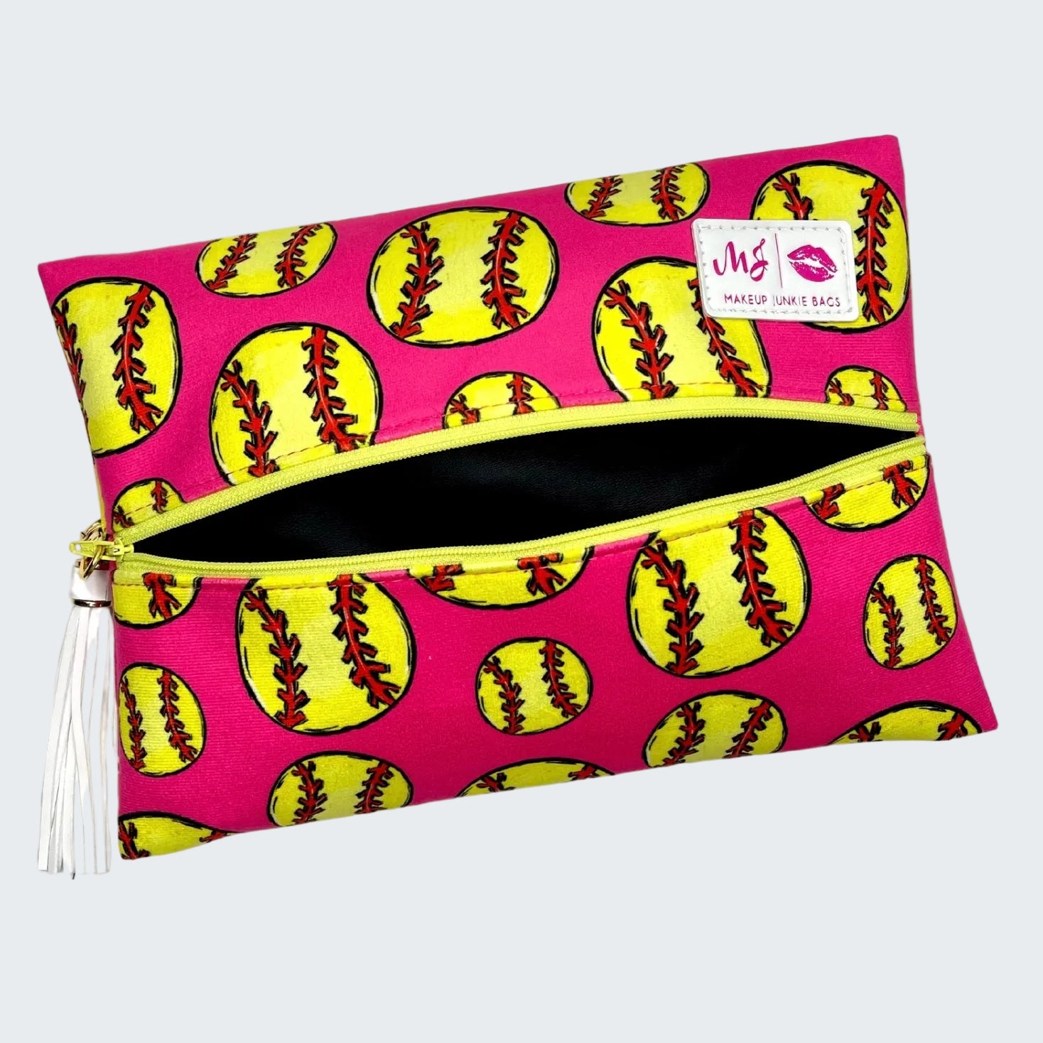 Makeup bag with softball pattern on a pink background