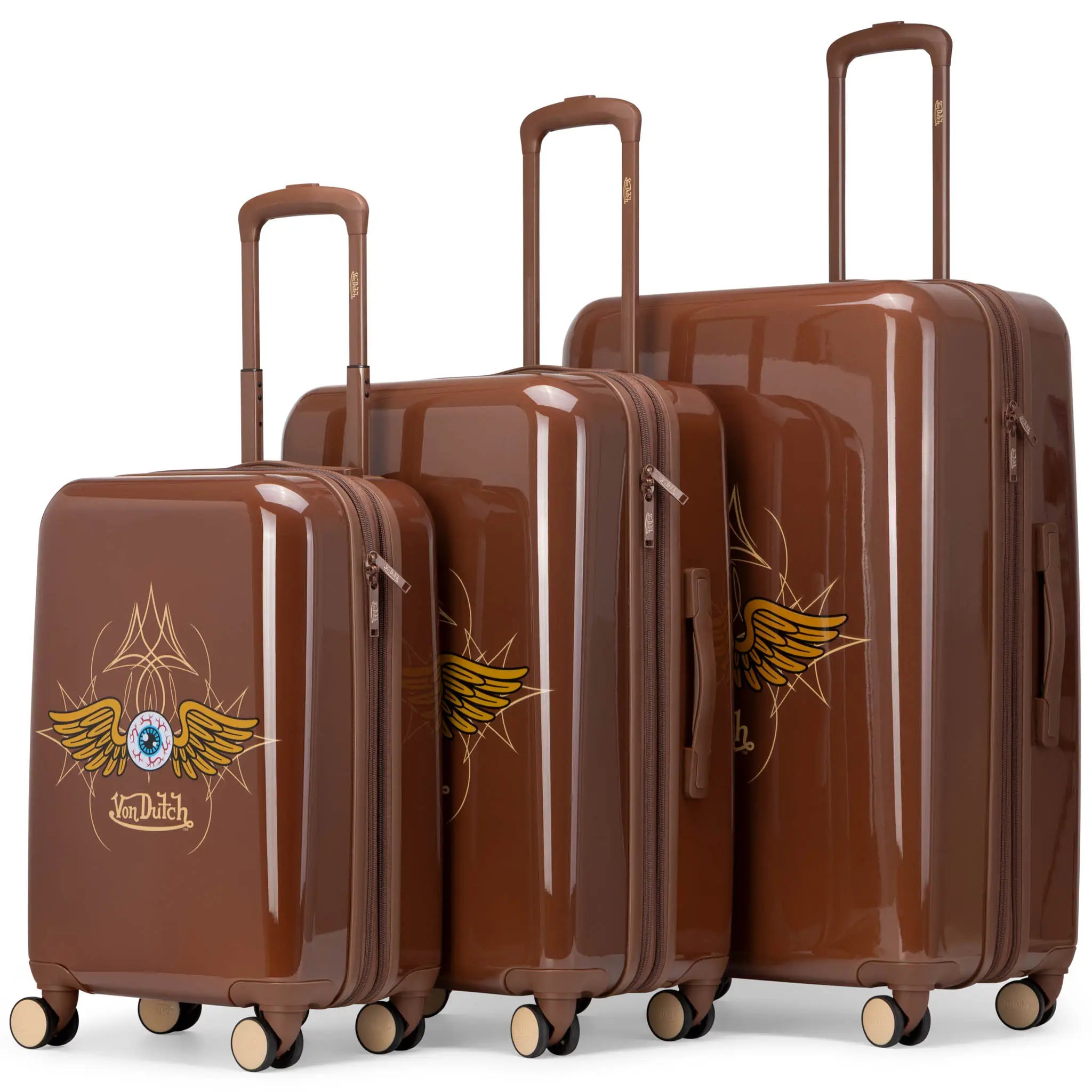Set of three brown suitcases with decorative elements on a white background