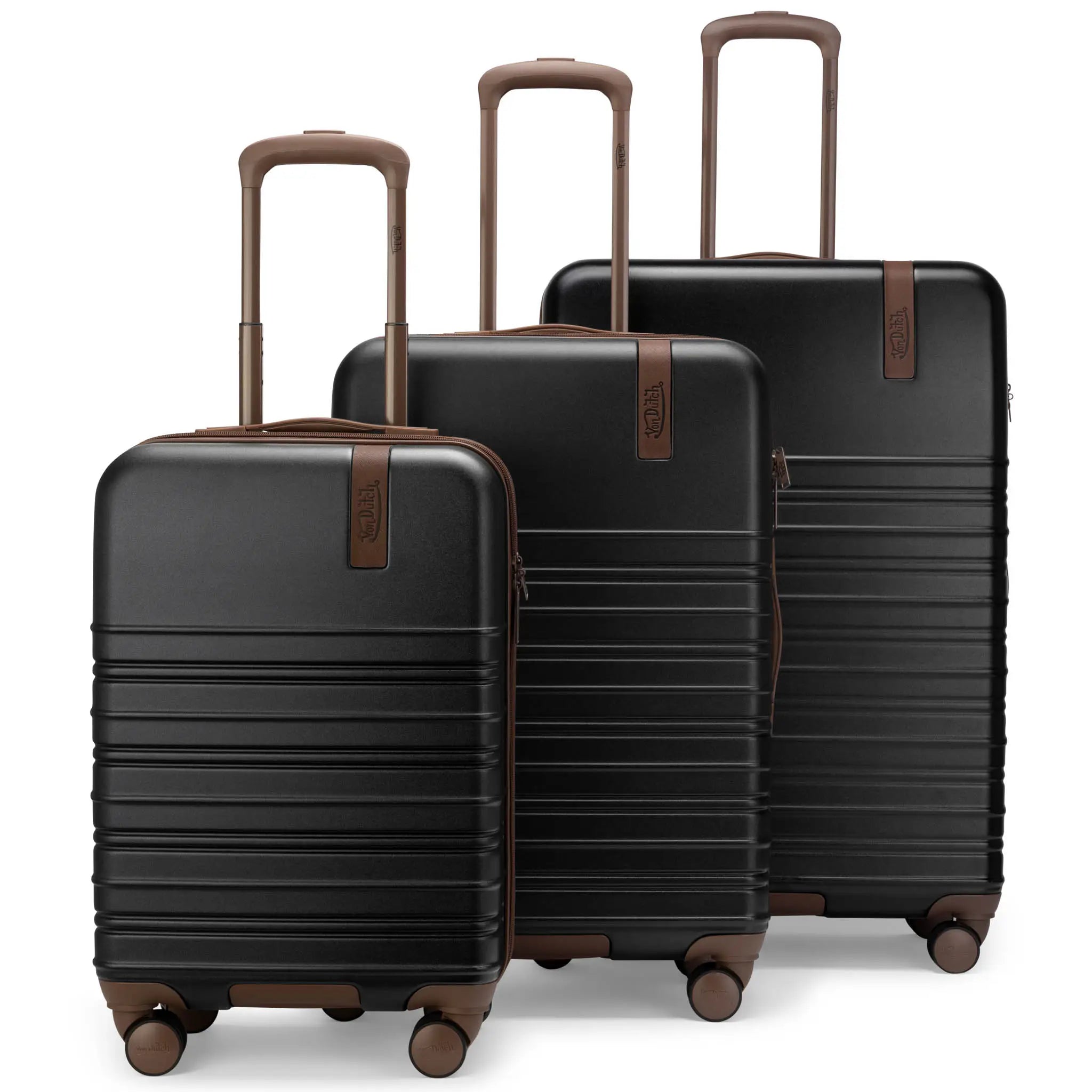 Three black suitcases with brown handles and wheels on a white background