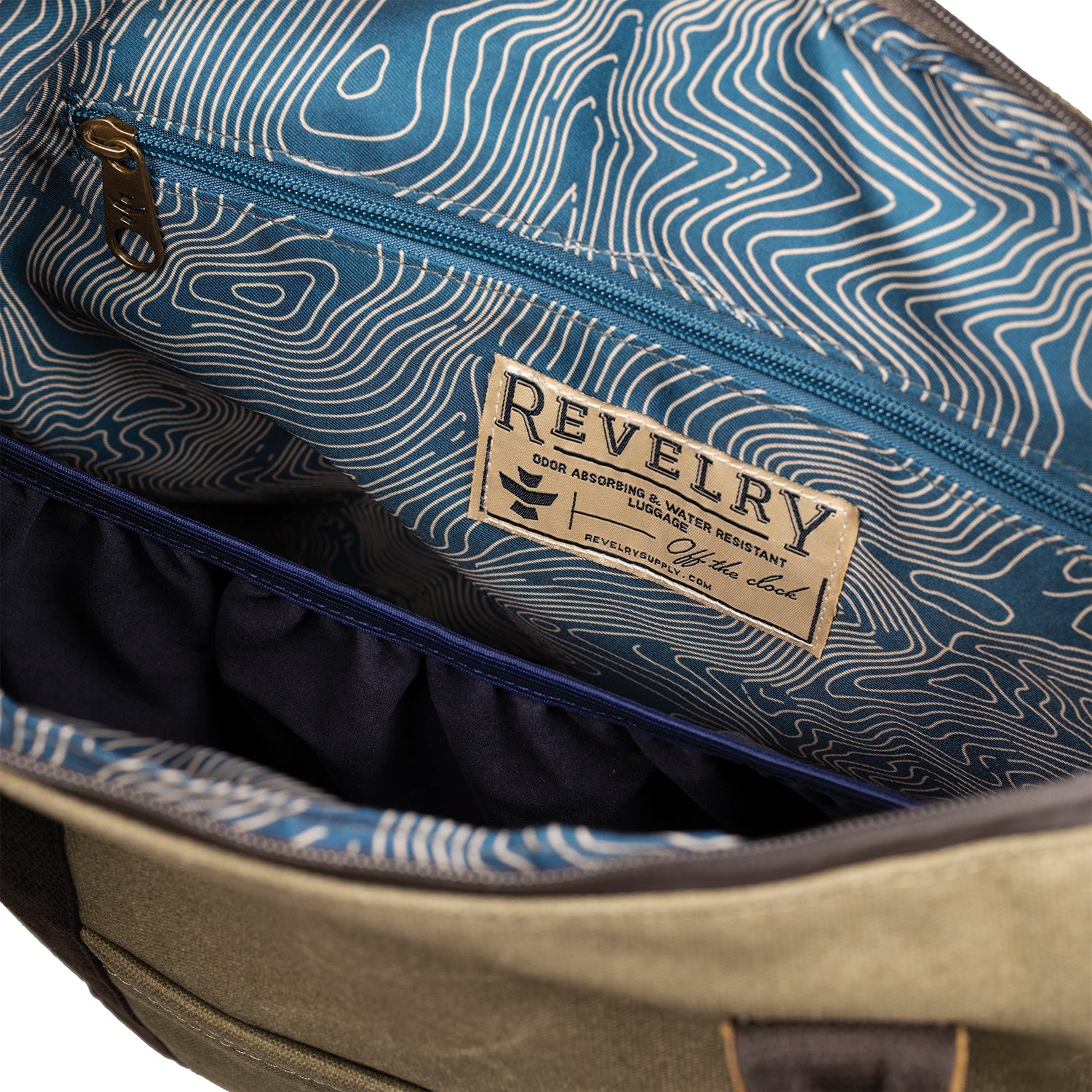 Backpack with 'Revelry' brand label showing blue and white pattern