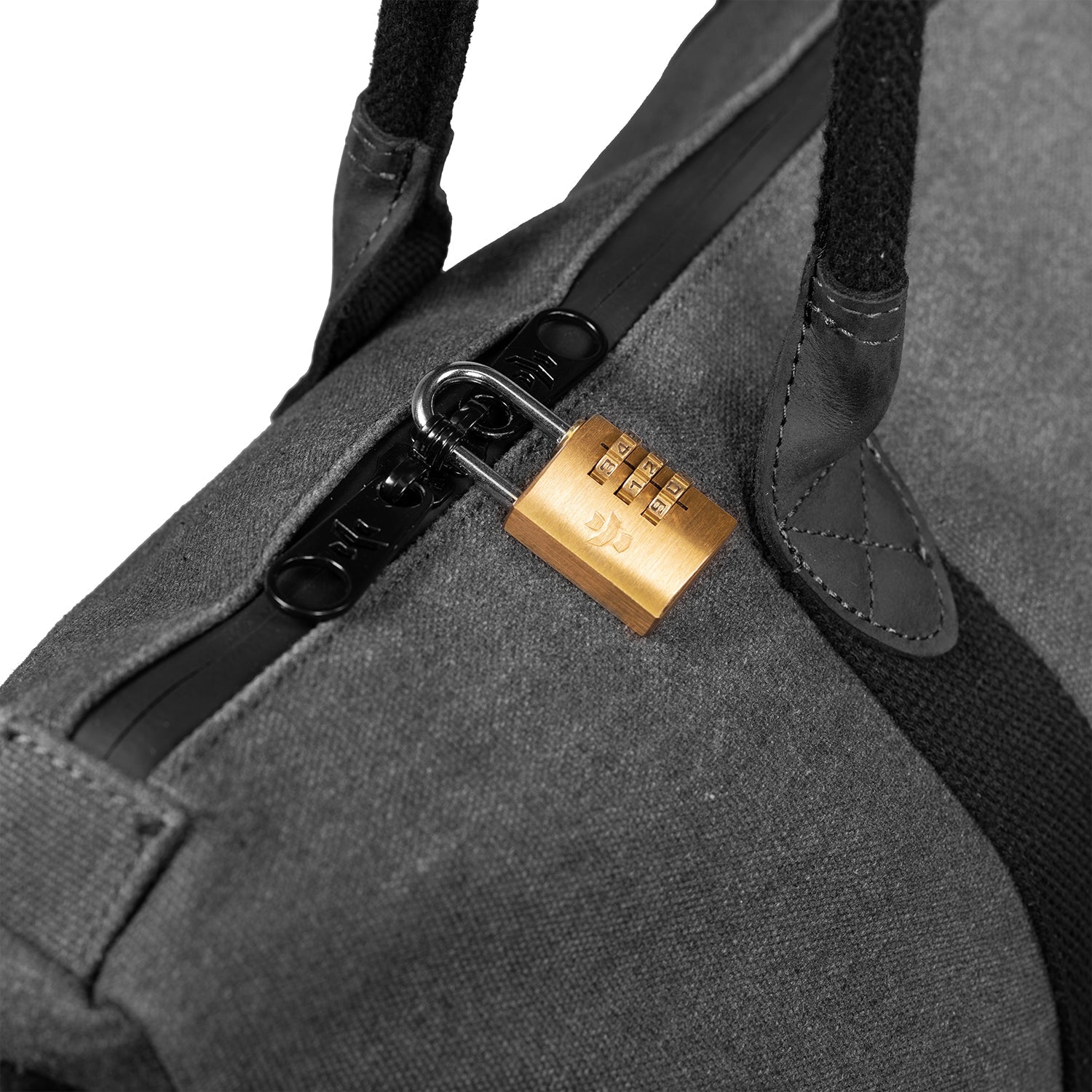 Gray bag with a gold combination lock on a white background