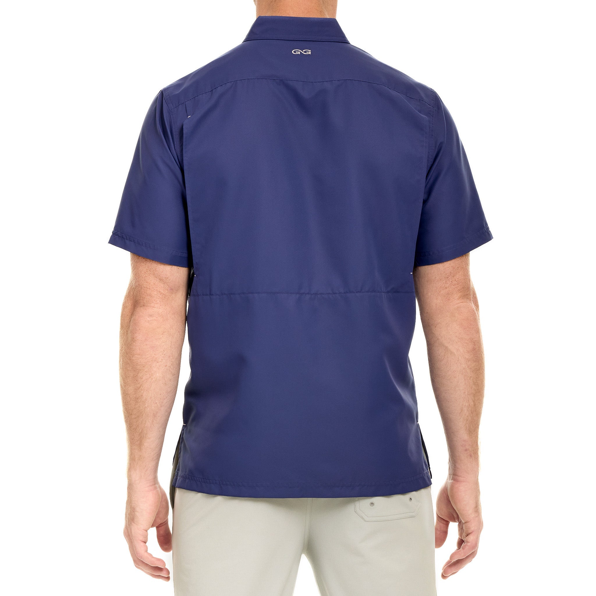 Back view of a person wearing a blue shirt on a white background