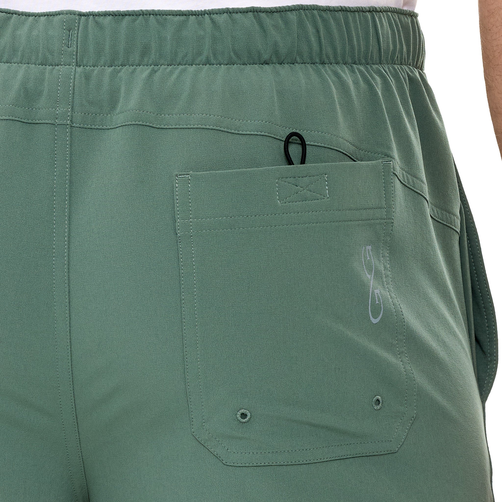 Green shorts with a pocket on a white background