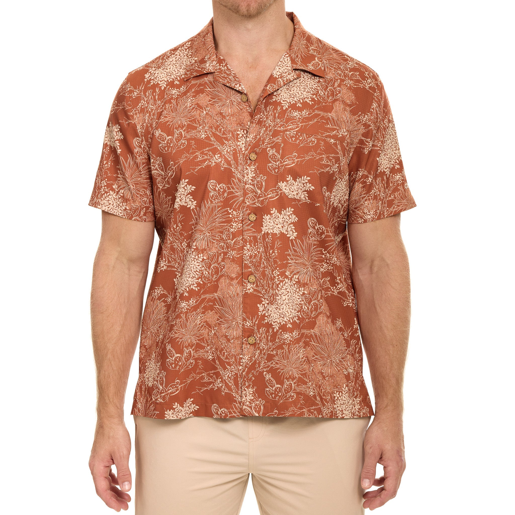 Man wearing a patterned shirt with a white background