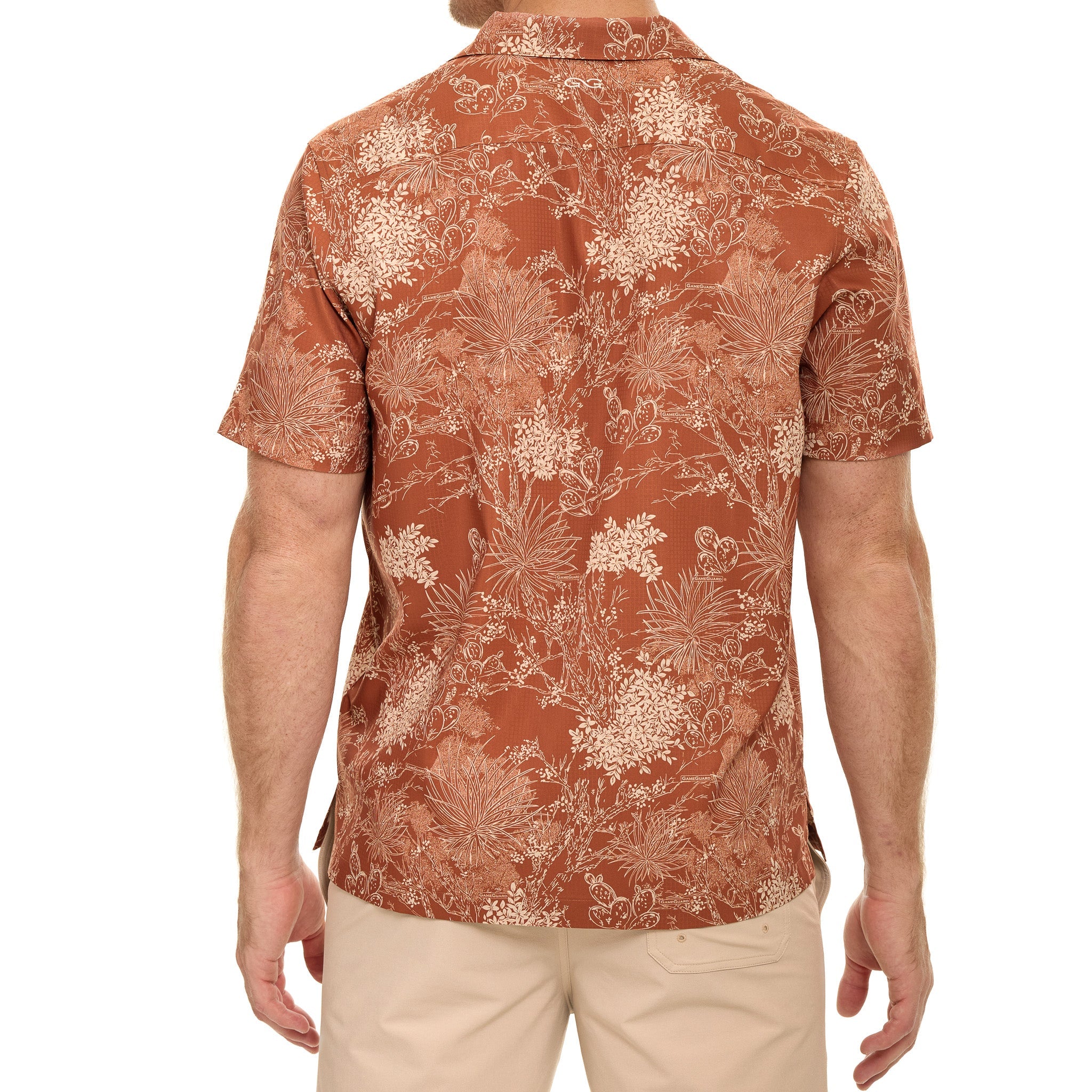 Man wearing a patterned shirt on a white background