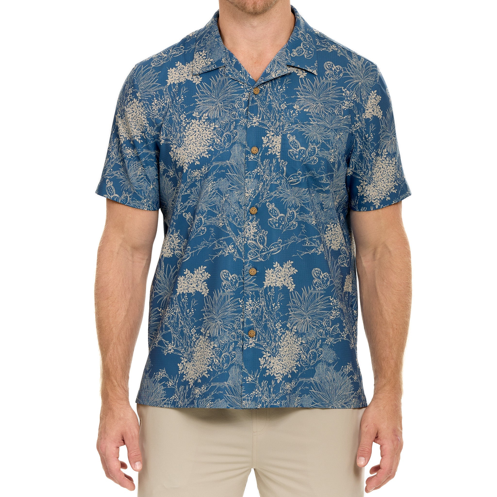 Man wearing a blue floral patterned shirt on a white background