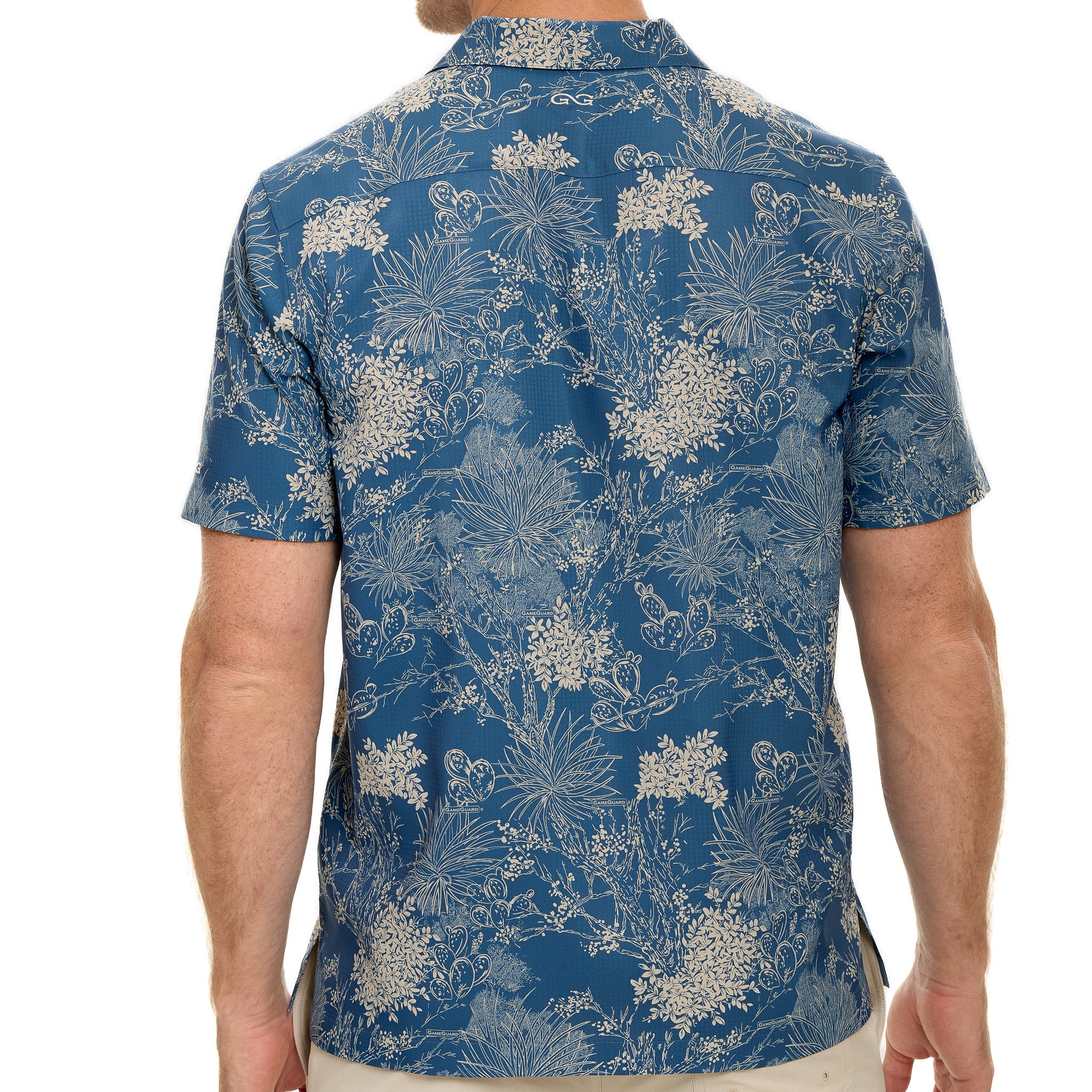 Blue floral patterned shirt worn by a person on a white background