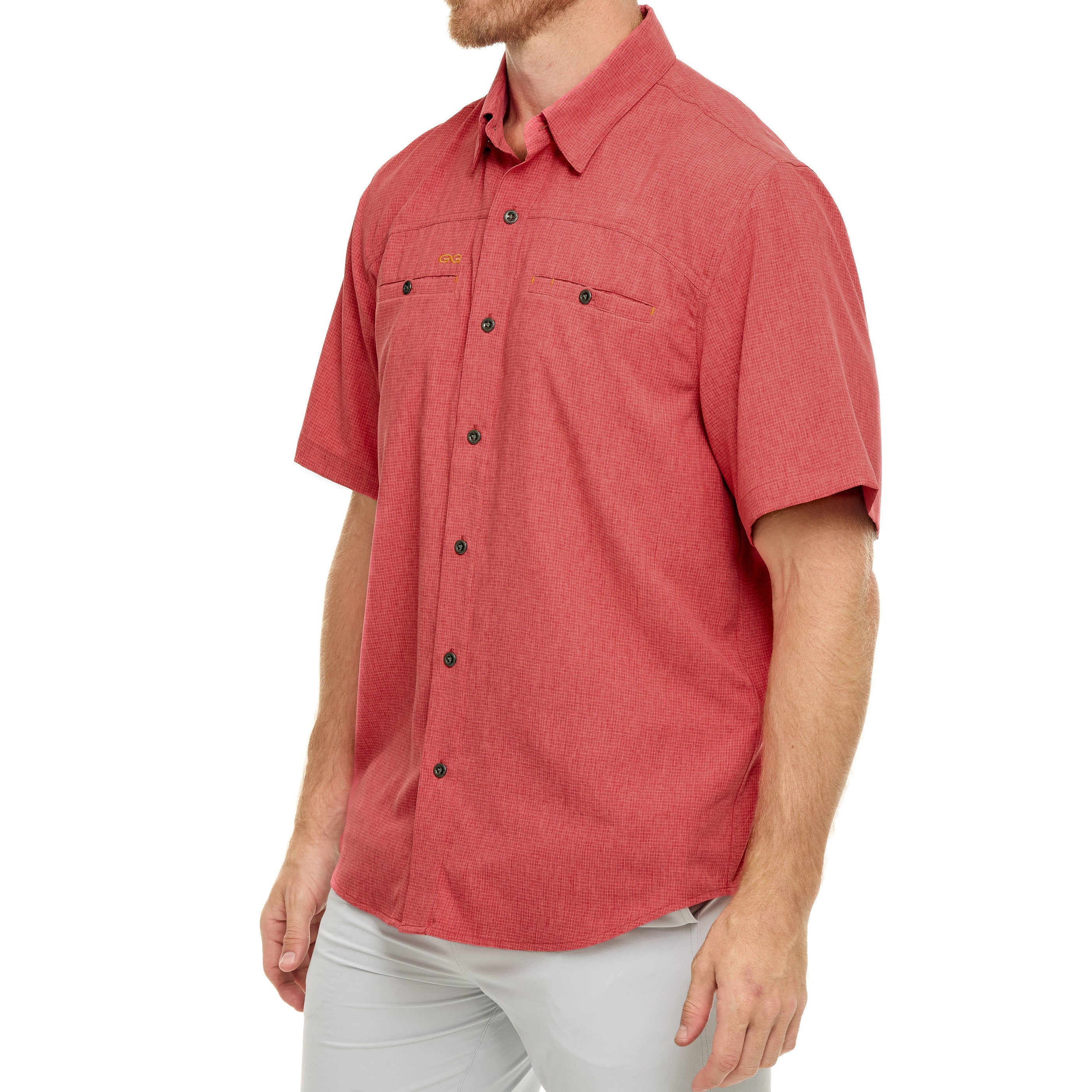 Red short-sleeve shirt worn by a person on a white background