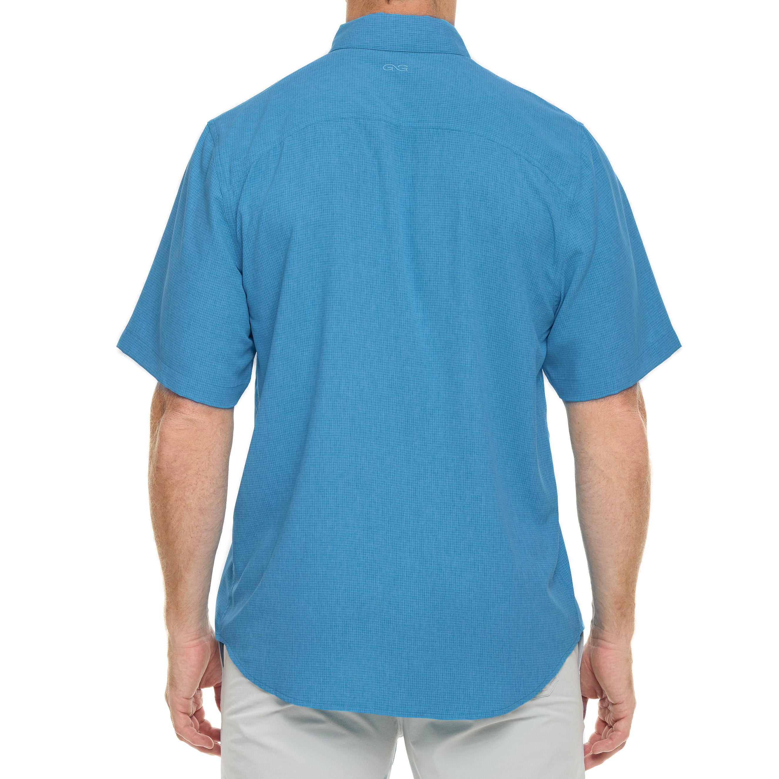 Blue short-sleeve shirt worn by a person on a white background