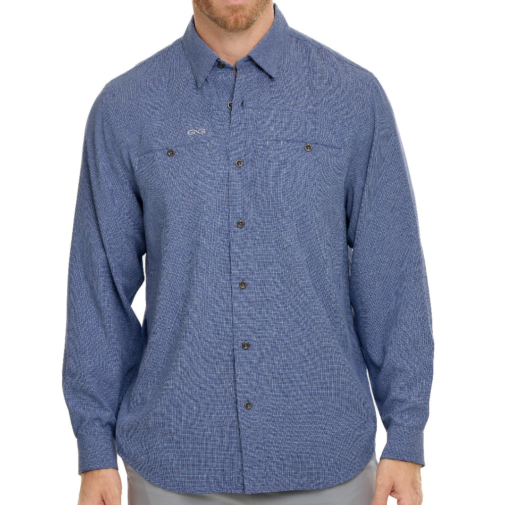 Blue patterned shirt worn by a person on a white background