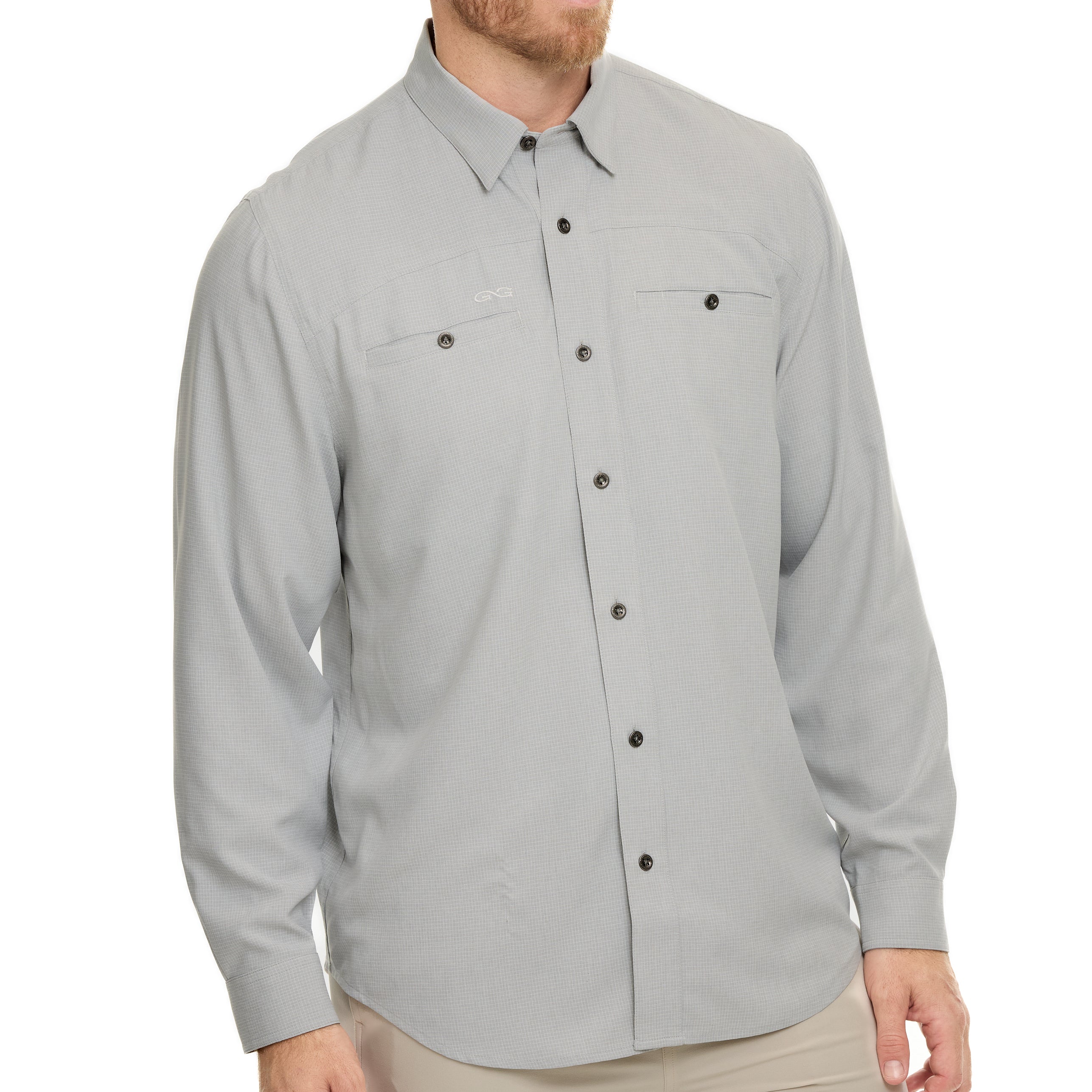Man wearing a gray button-up shirt on a white background